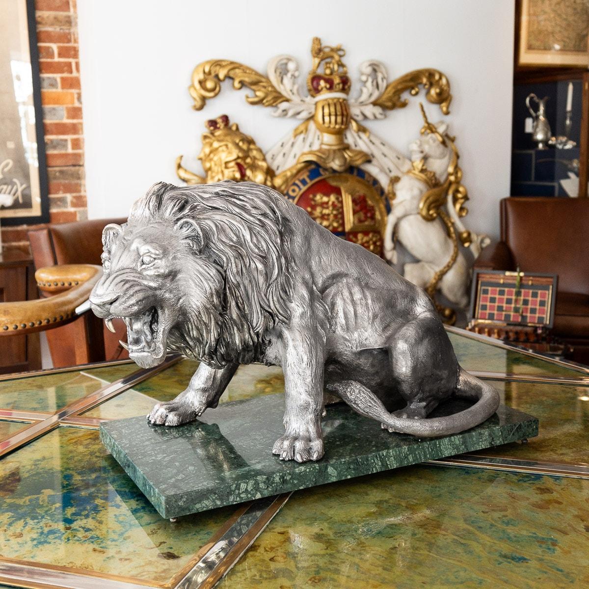 Stunning 20th century Italian solid silver monumental statue of a lion on a marble base, beautifully modelled as a seated roaring lion, fitted on a rectangular green marble plinth. Hallmarked 925 (925 silver standard), 871 FI (Firenze), 1968 -