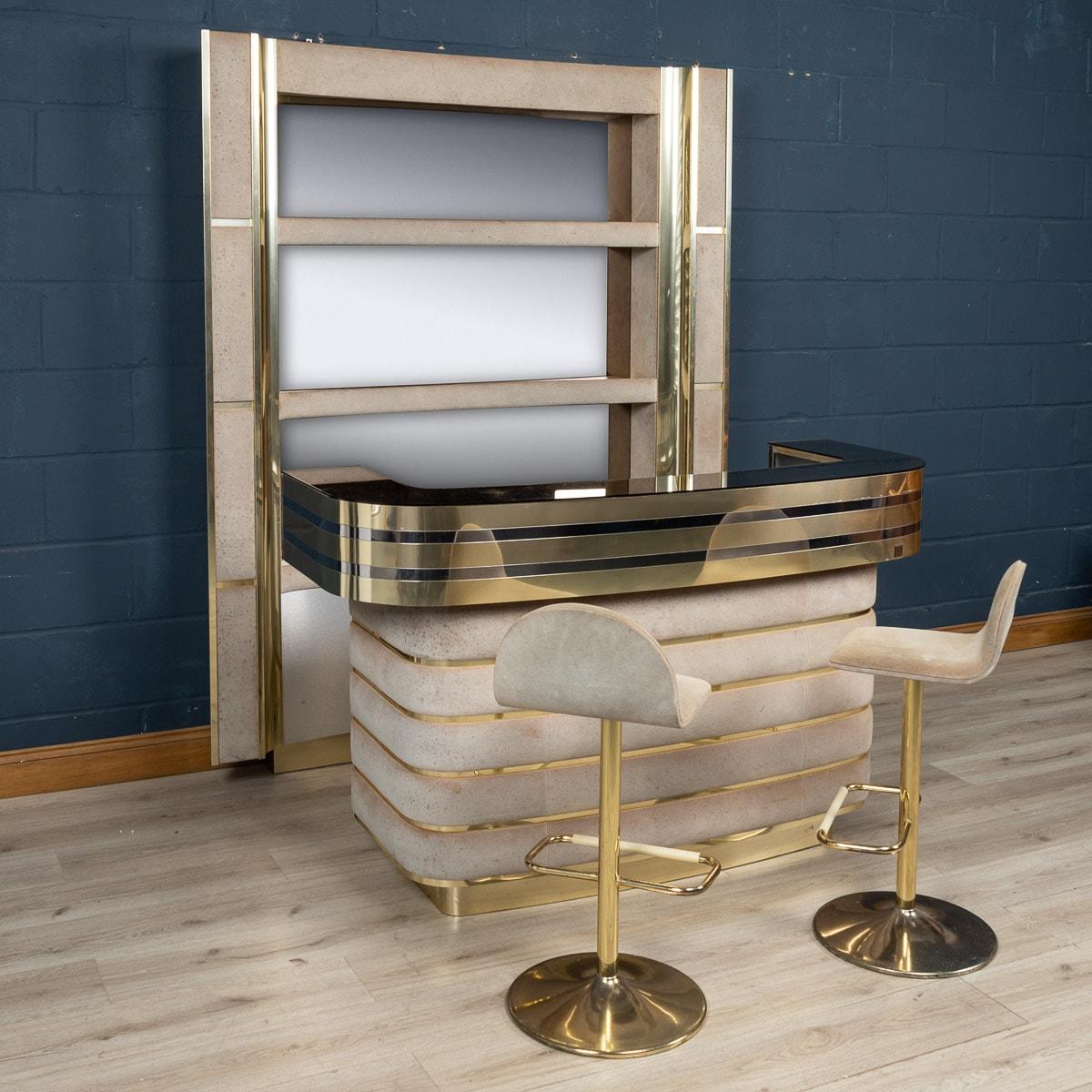 A stunning vintage cocktail bar finished in alcantara leather and steel, designed and engineered by Willy Rizzo in the 1970s. His glamorous bars are amongst the most sought after objects from his work. The example on offer was realised in the 1970s