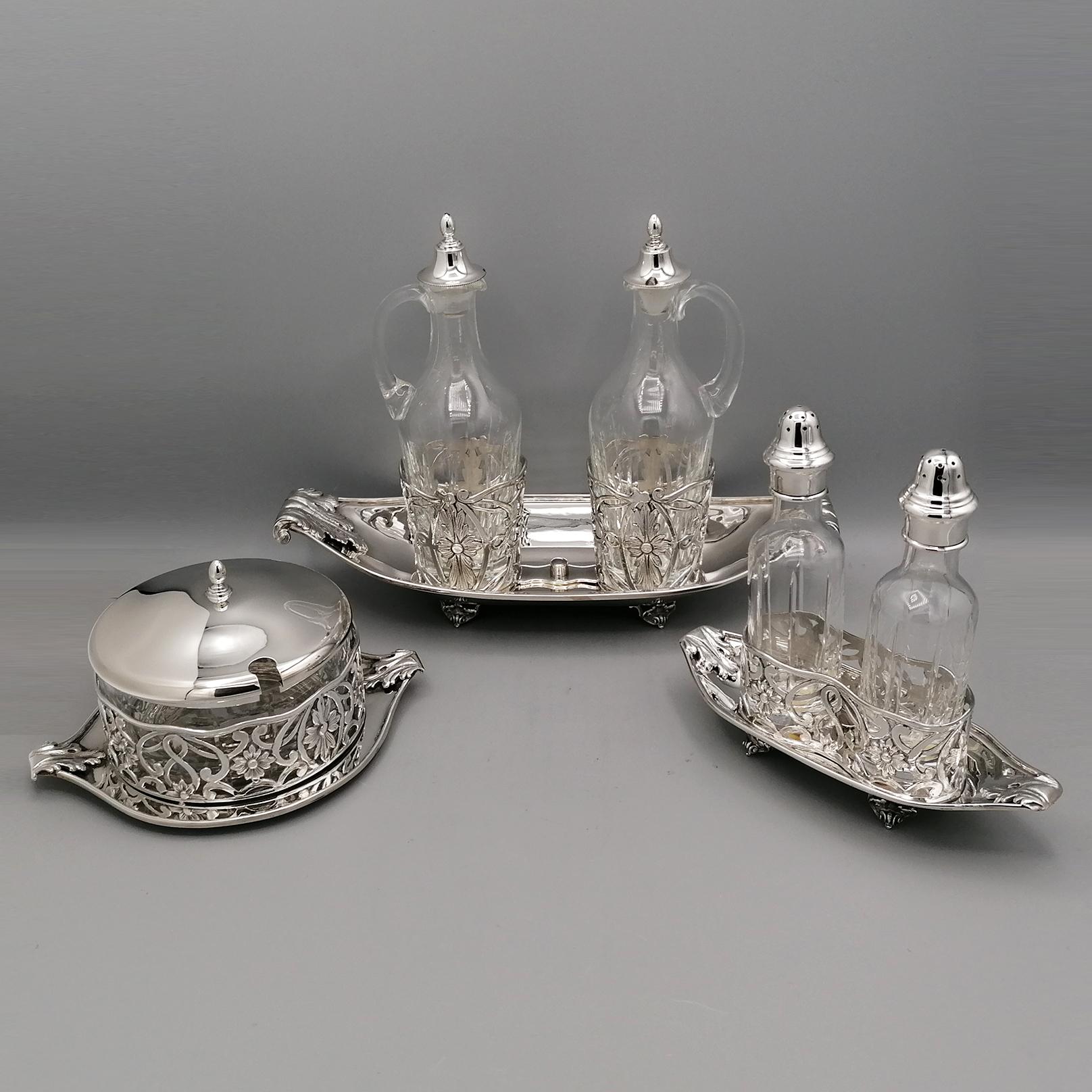 Set of Art Nuoveau - Liberty replica of oil cruet, parmesan bowl and salt/pepper in 925 Sterling silver made in Milan. Italy, late 20th century.
The whole set was made by hand, modeling the small trays of the oil cruet, the parmesan bowl and the