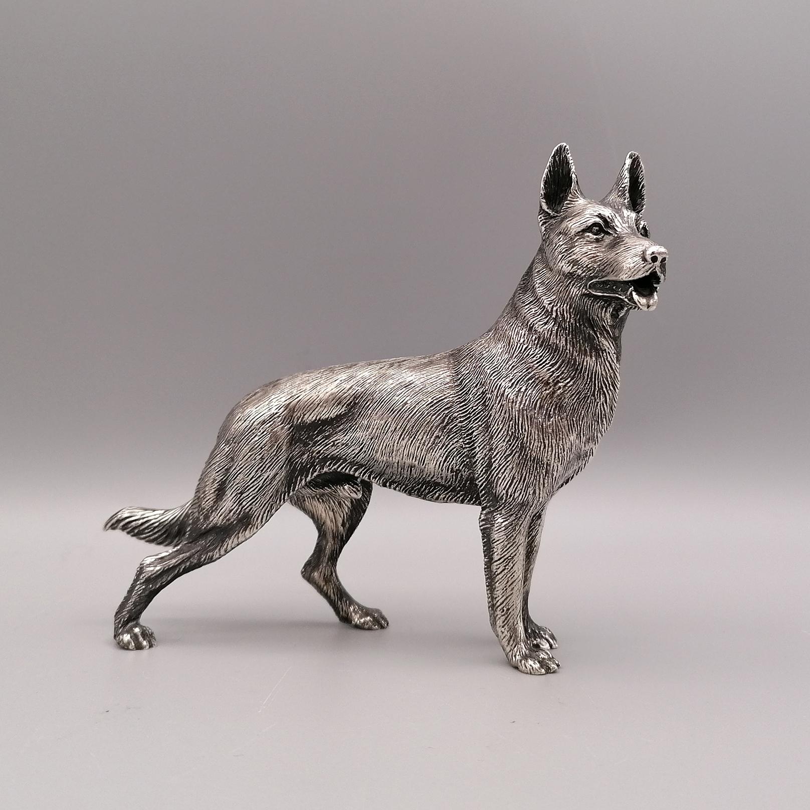 German Shepherd dog sculpture in sterling silver.
The sculpture of the German Shepherd dog was made with the 925 sterling silver casting method and masterfully finished with chisel which makes the details perfect. 

By Argenteria Sorini - Arezzo
