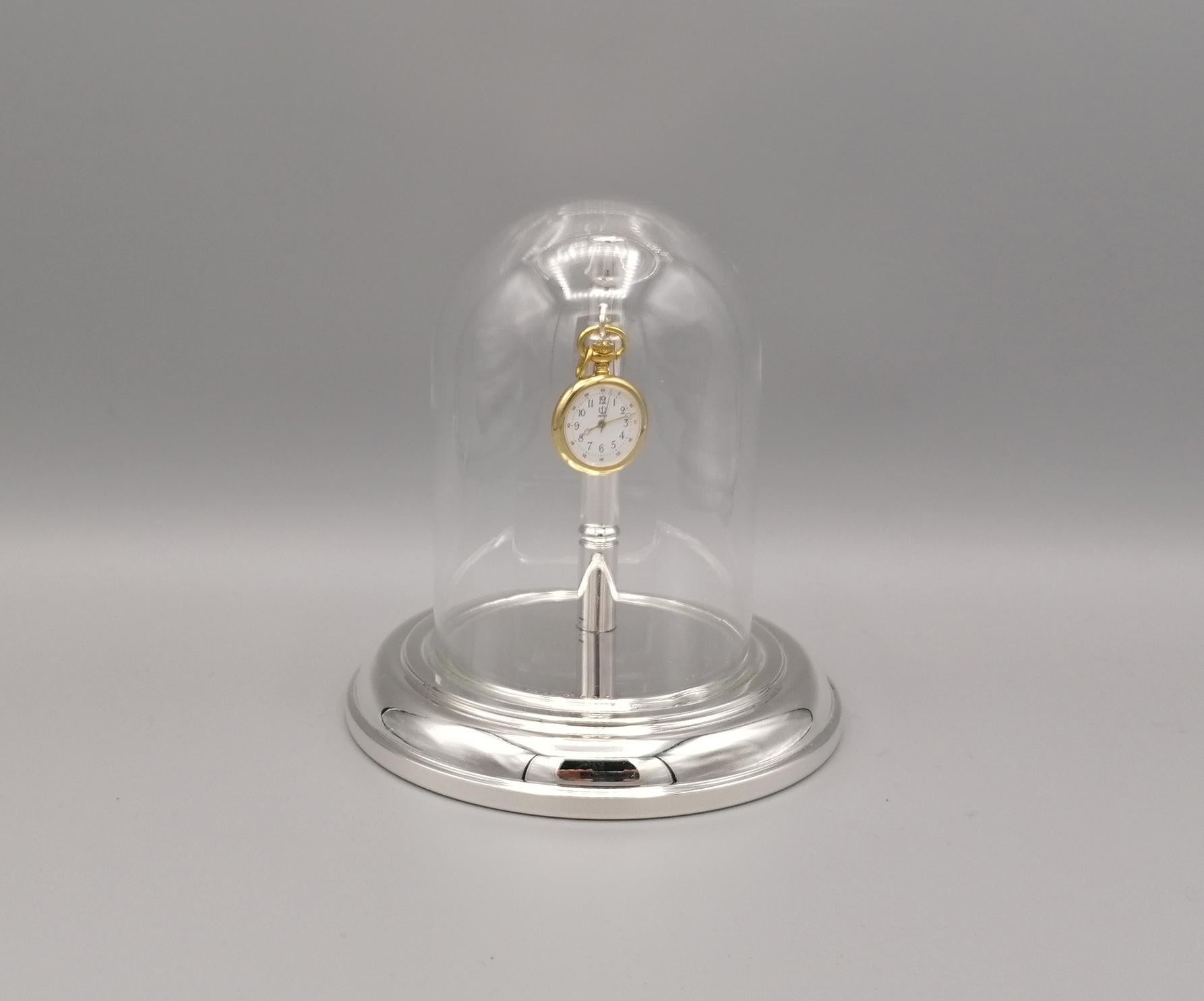 Stand for watch in sterling silver formed by a smooth round base and a rod also in silver, where a hook has been fixed to be able to hang a pocket watch.

The watch is not supplied with the stand.
It was photographed to give an idea of the