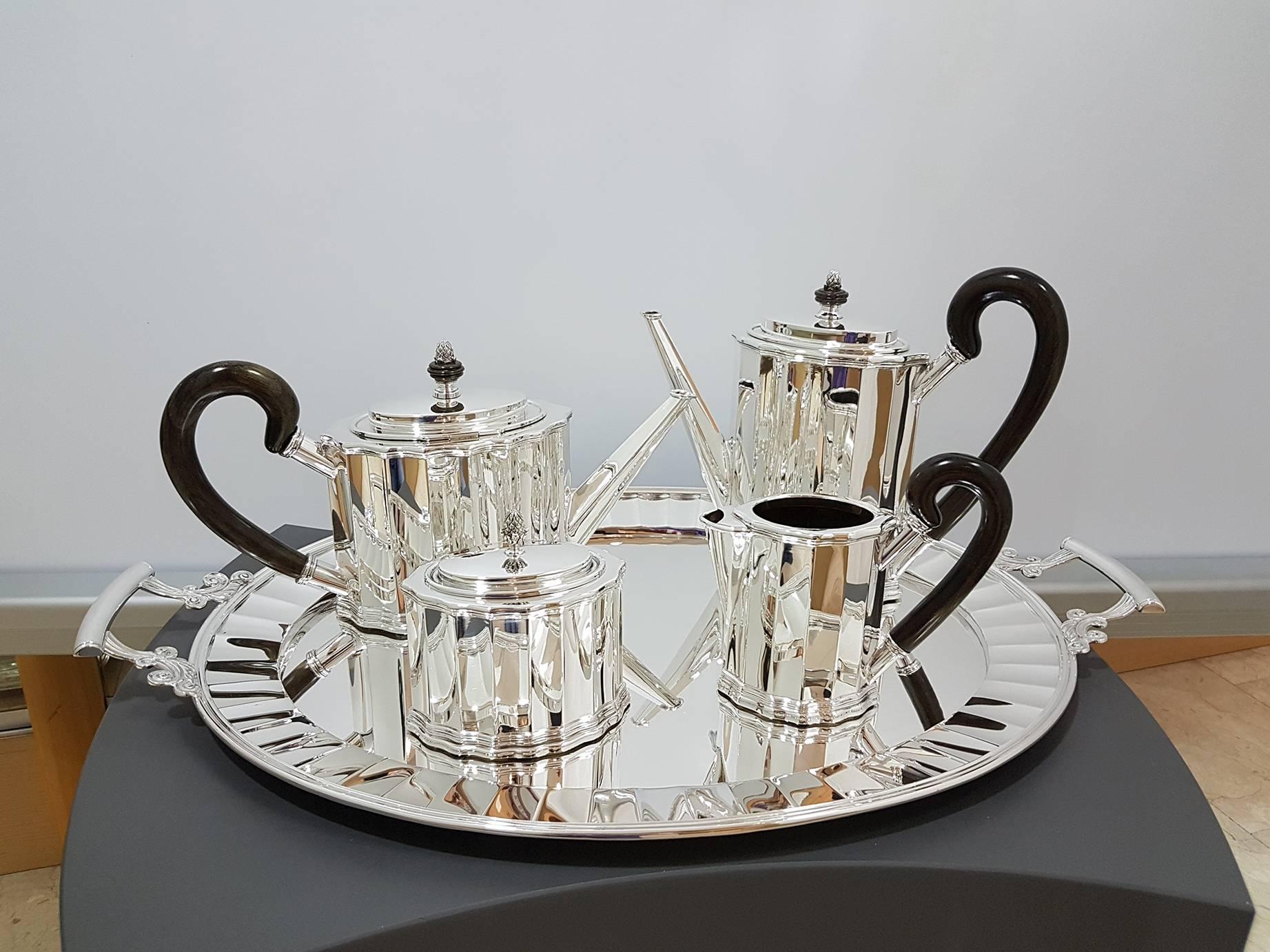 Fully handmade sterling silver tea and coffee set.
The shape is oval with concave grooves that make the tea and coffee service extremely bright.
The upper and lower edges of the coffee pot, teapot, milk jug and sugar bowl have been molded and welded