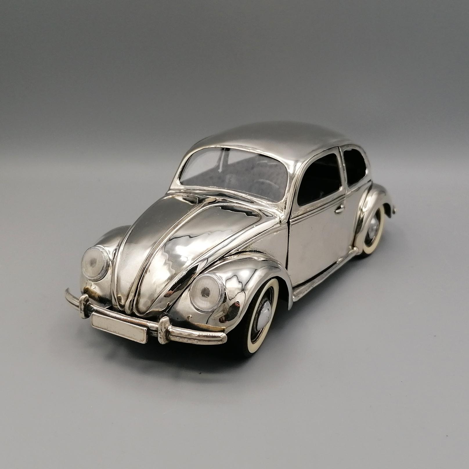 silver vw beetle