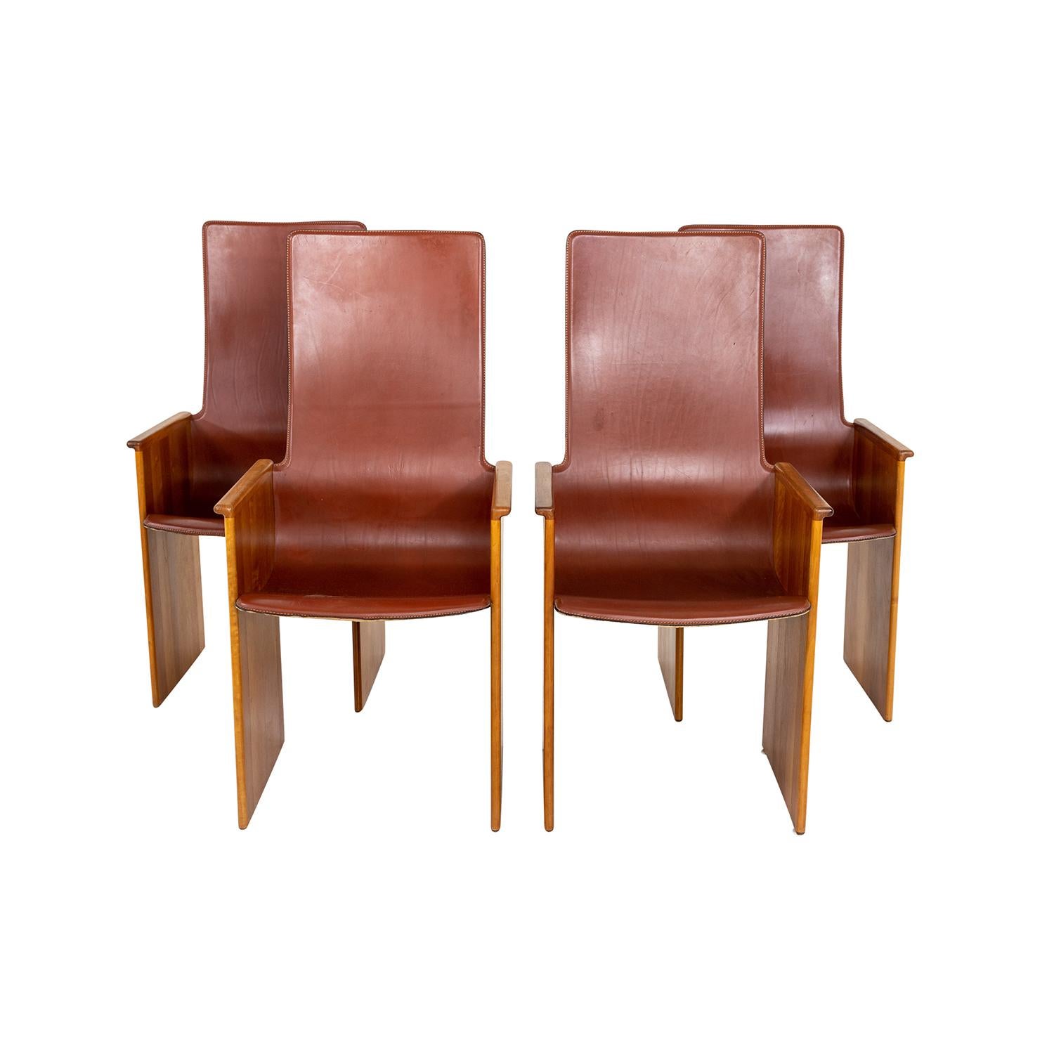 A light-brown, vintage Mid-Century Modern Italian set of four Torcello armchairs made of handcrafted veneered Maplewood, designed by Afra & Tobia Scarpa and produced by Stildomus in good condition. The sculptural polished center chairs are covered