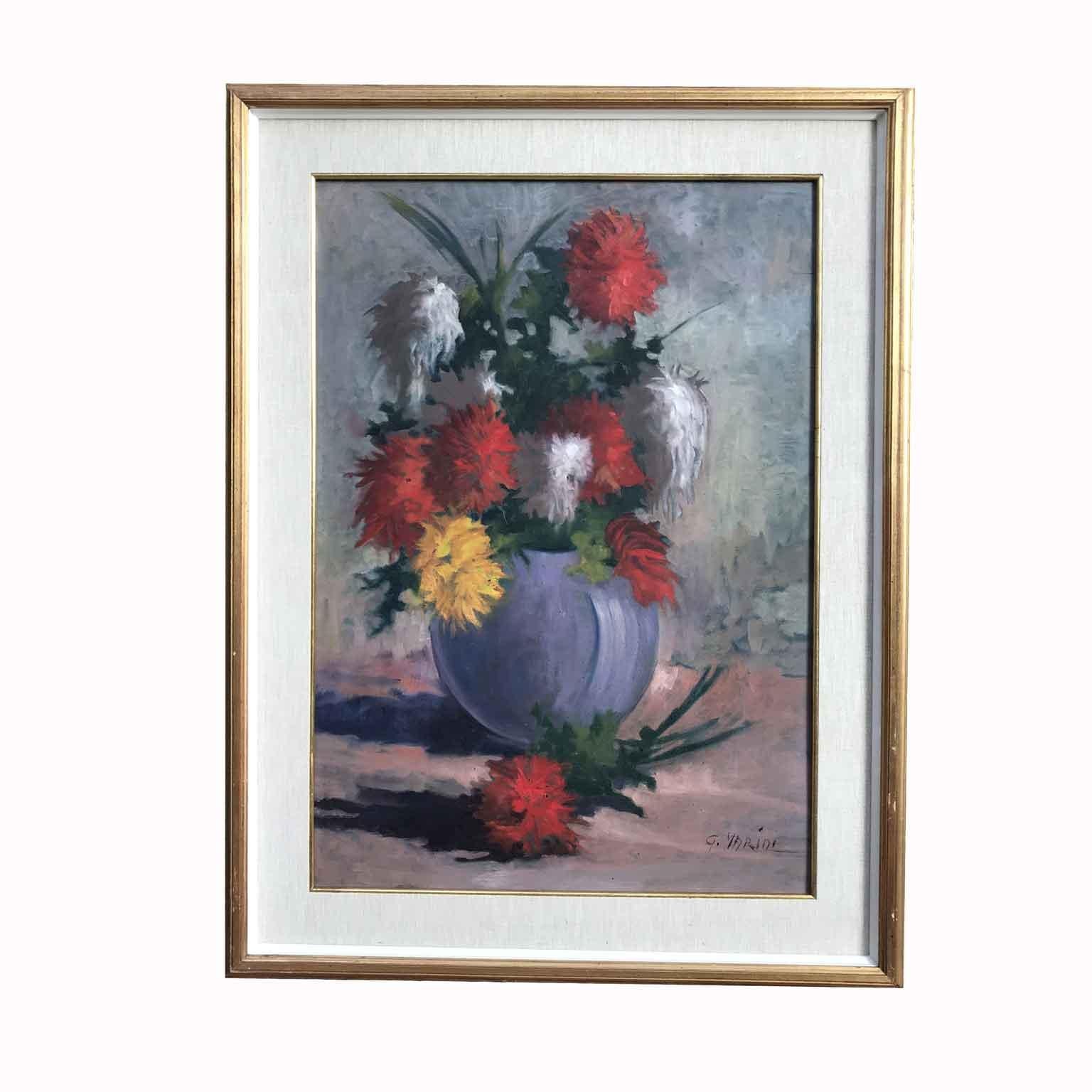 A flowers painting an Italian polychrome shiny colors flower composition, a 20th century Italian still-life of flowers, oil painted on wooden panel, signed lower left G.MARINI, a dahlia flower composition set in a blue pottery vase.

This young