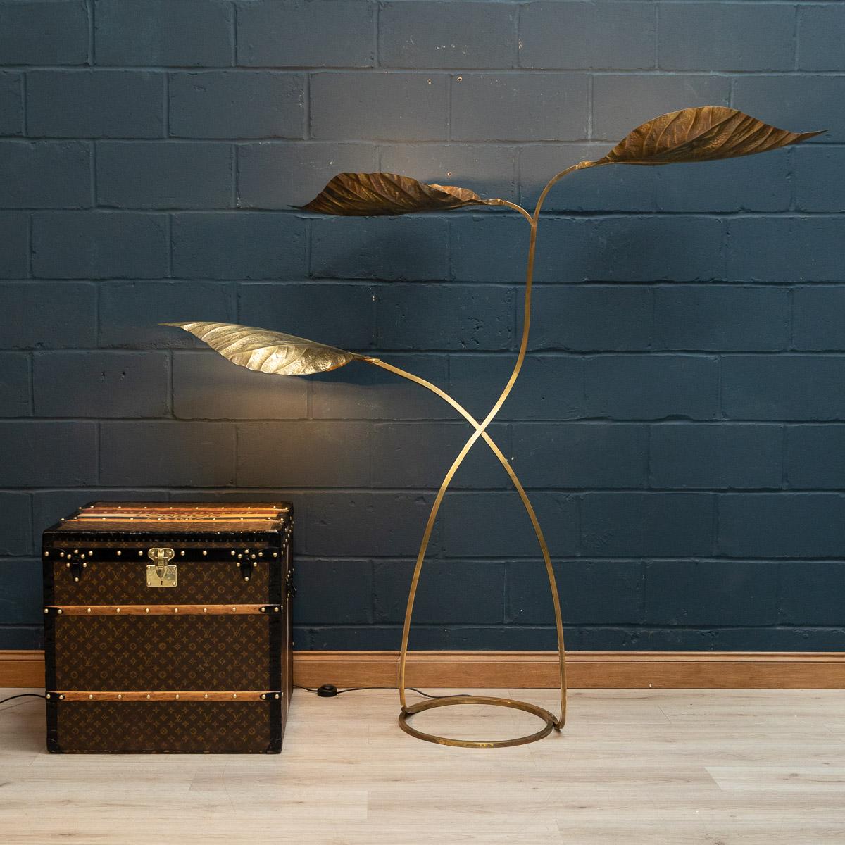 A wonderful 3 leaf floor lamp by Tommaso Barbi with attachments for 3 lights, the brass structure supporting pressed brass leaves. The length of each leaf can be adjusted slightly thanks to a telescopic thread at the base of each.

Condition

In