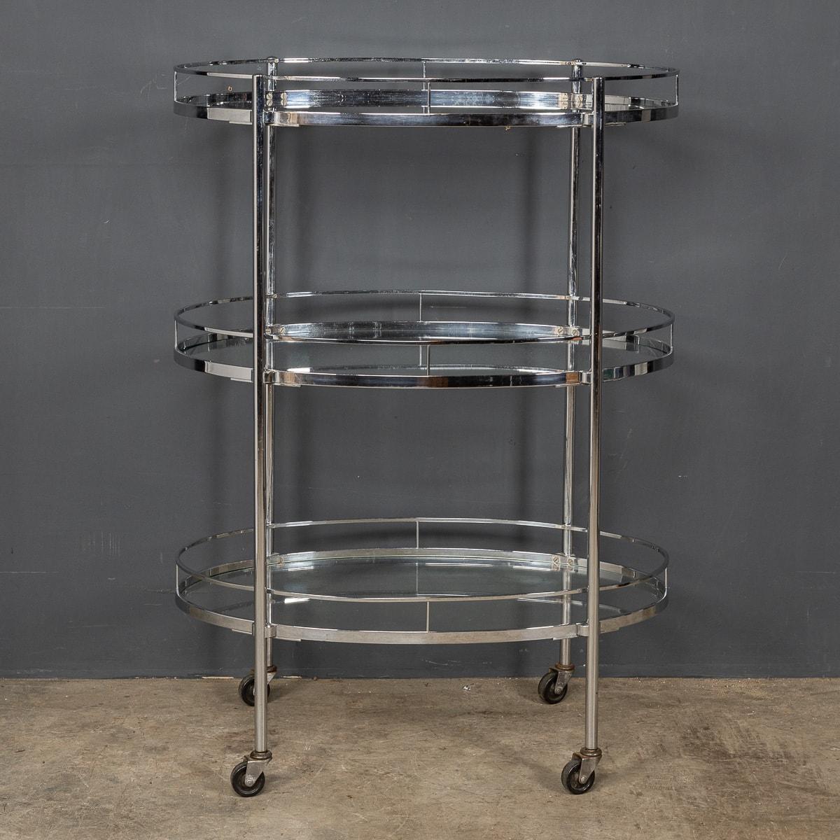 A Classic 1950s Italian chrome cart with three tiers of glass trays on smooth rolling castors. c.1950-1959.

CONDITION
In Good Condition - some wear consistent with age.

Size
Height: 108cm
Width: 77cm
Depth: 47cm.