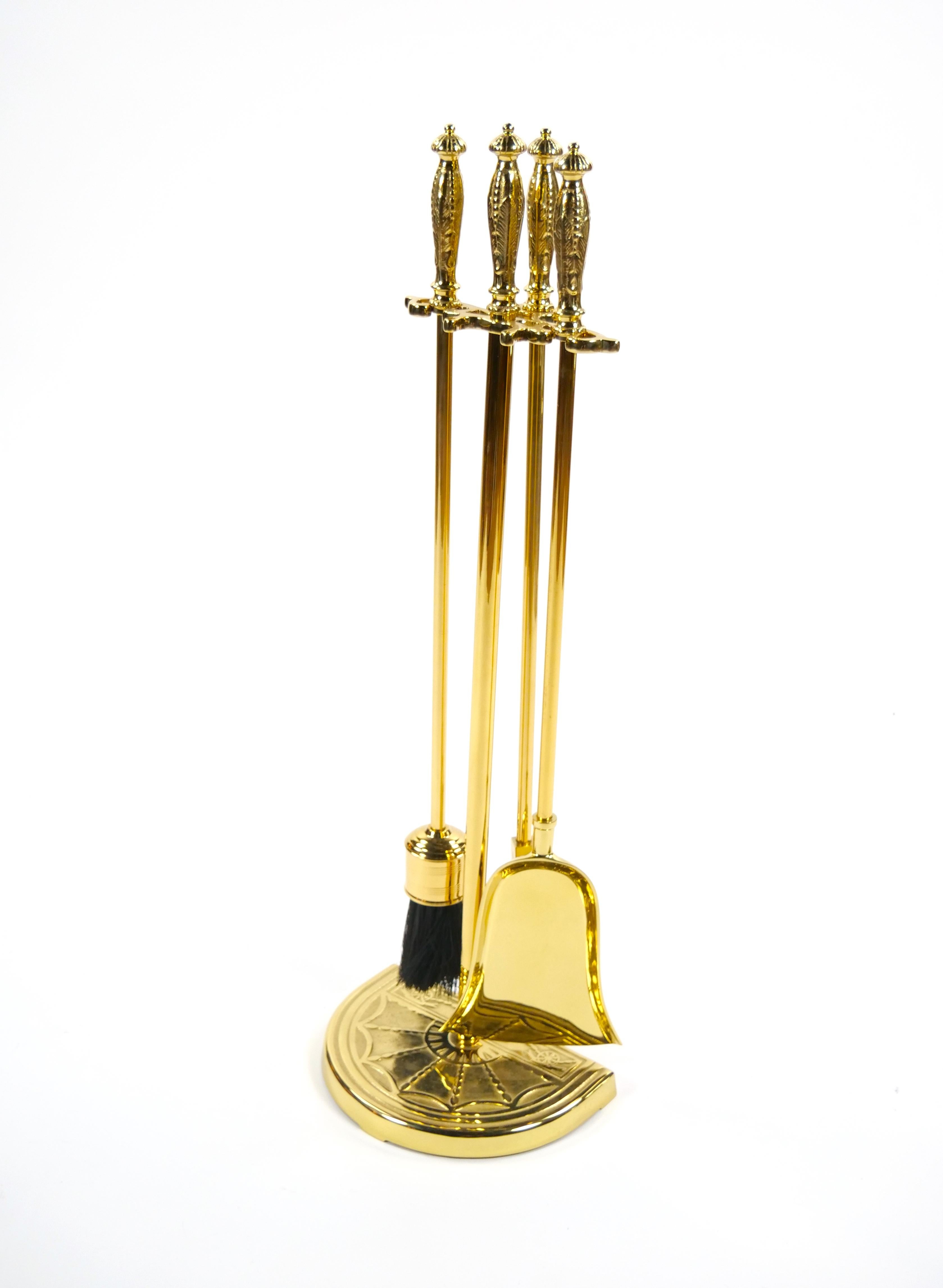 Add timeless elegance to your hearth with this stunning set of Italian fireplace tools, crafted in the late 20th century in the Victorian style. This three-piece set includes a shovel, brush, and poker, each featuring polished gilt brass handles