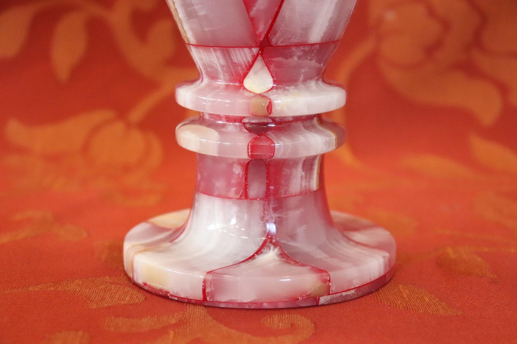 Particular Italian artistic vase made with Carrara marble mosaic tiles. Particular color with pink and red veins.