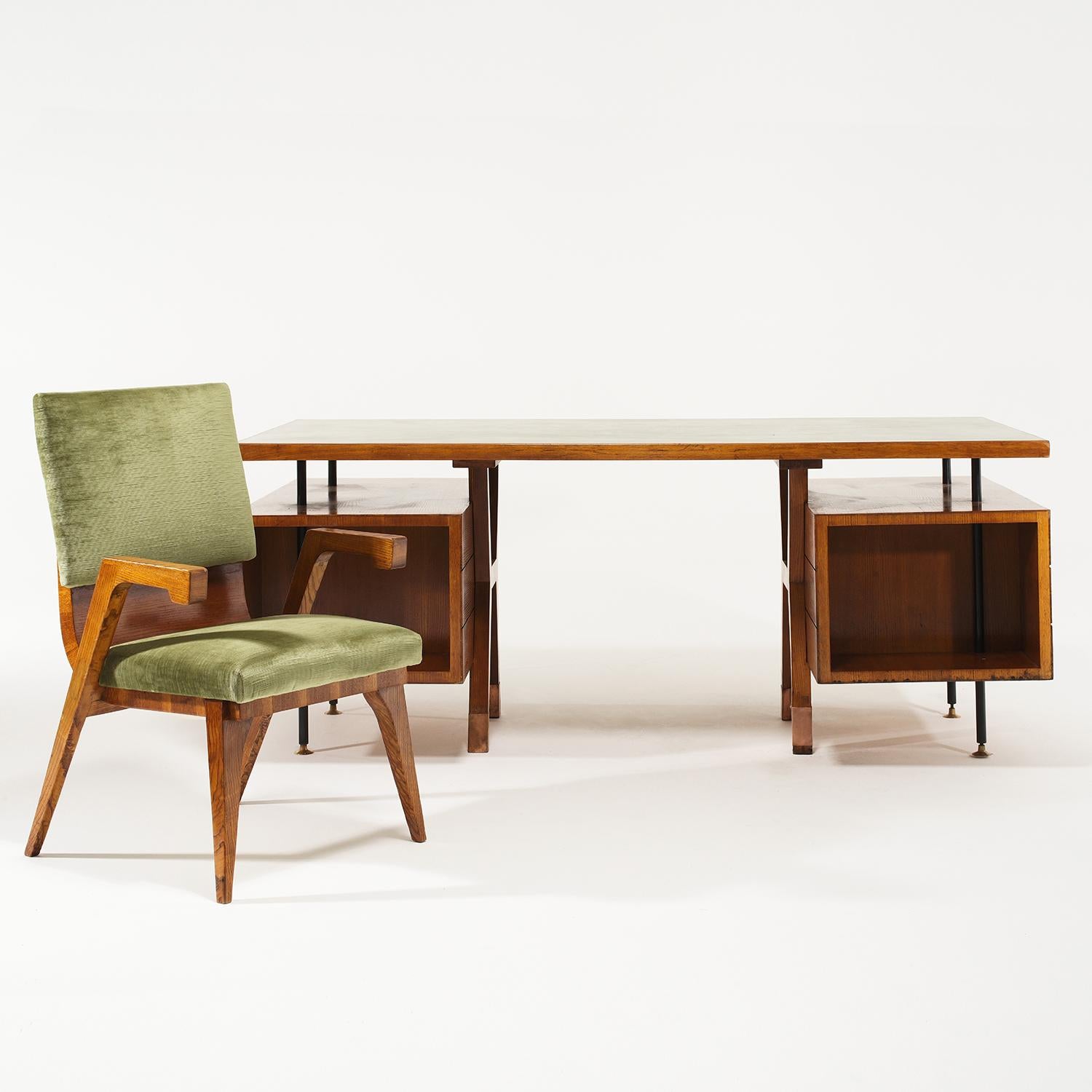 A vintage Mid-Century modern Italian office set of a writing desk and an armchair made of hand crafted polished Walnut, designed by Amleto Sartori in good condition. The floating rectangular top is made of hand painted colored laminate. The desk is