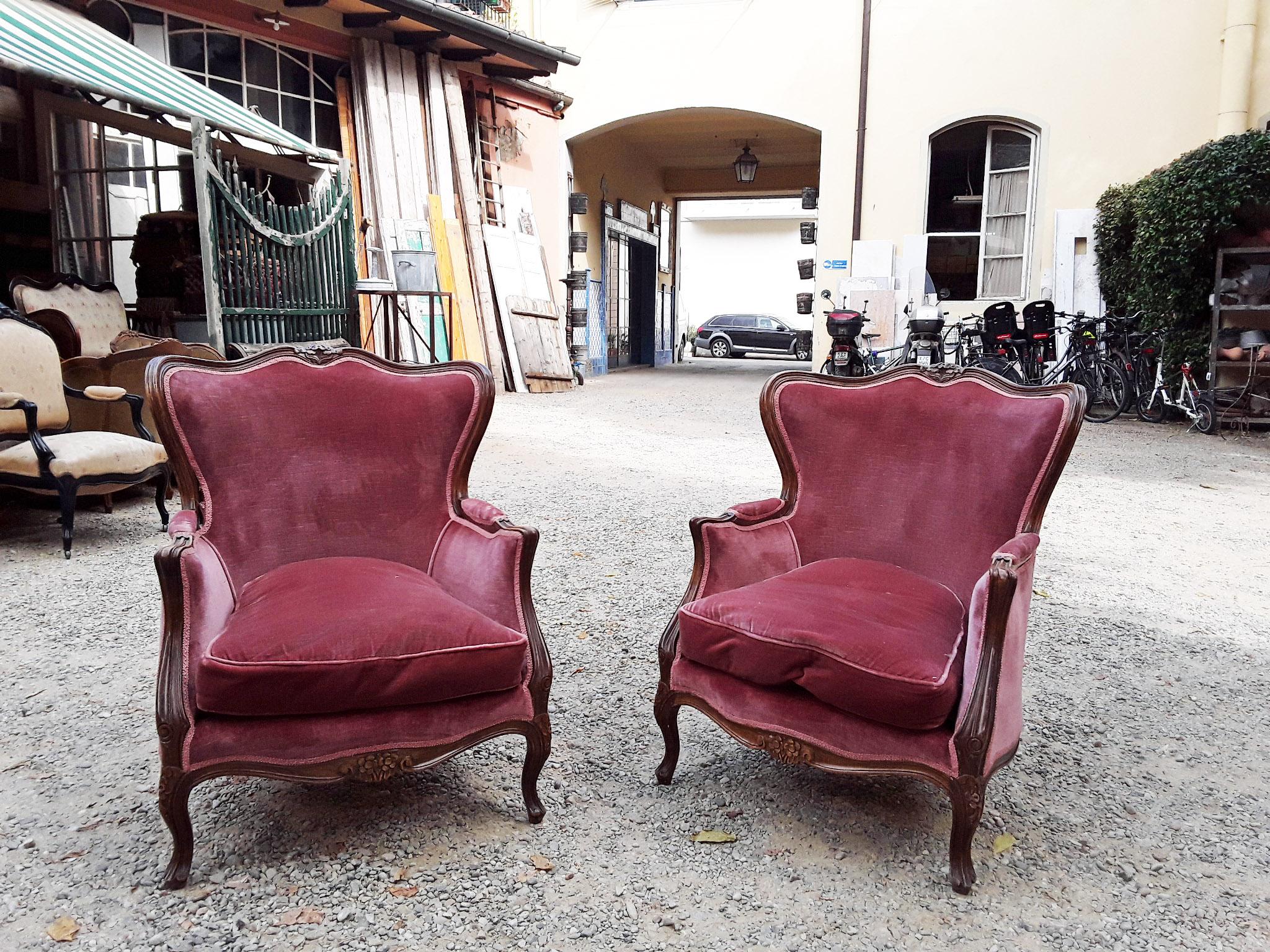 20th century couple of Italian walnut armchairs with cherry colour original velvet fabric.