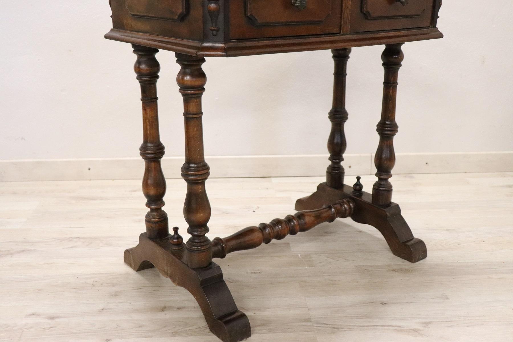 Beautiful side table, 1880s in walnut. The plan presents precious work of inlay with chess. Table with elegant turned legs. Two comfortable drawers on the front and two small drawers on the sides. The table is in perfect conditions.