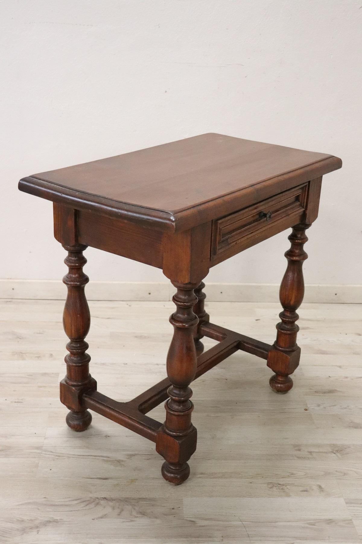 Beautiful side table, 1990s in walnut. Table with elegant turned legs. One comfortable drawer on the front. The table is in perfect conditions.