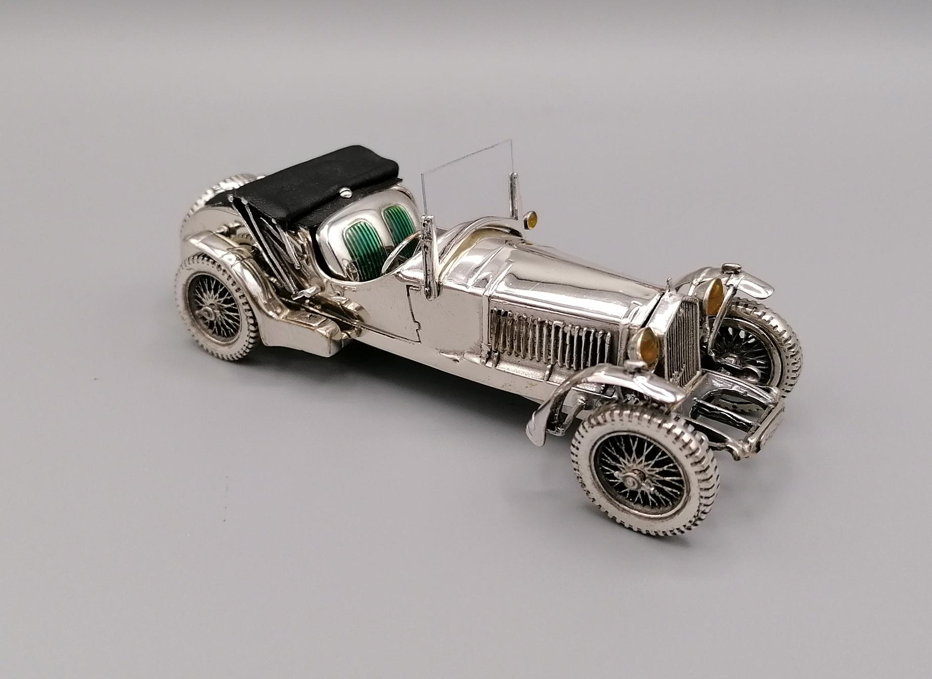 Sterling silver car model of the famous 1933 Italian Alfa Romeo 8C2300 convertible
The processing was made in fusion and finished with chisel

Alfa Romeo 8C is the name of a series of sports cars produced by the Italian car manufacturer Alfa