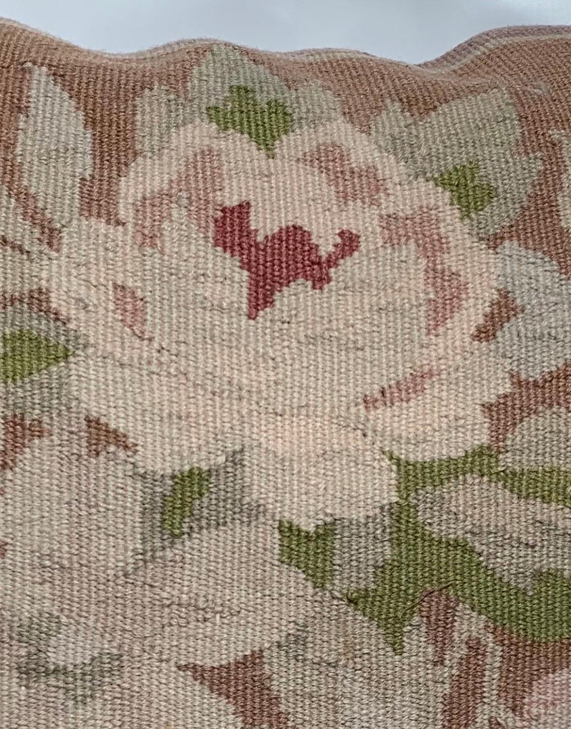 This is a lovely 20th century Radiant French Aubusson tapestry pillow with symmetrical flower and leaf design. Made of wool with a cotton cloth backing. It is new and has never been used.

Measures: 16 x 16 inches

Free shipping!