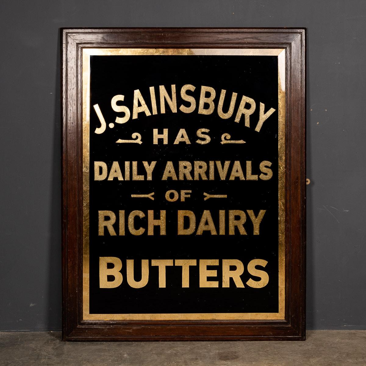 A mid 20th Century J. Sainsbury's Dairy advertising mirror in an original mahogany frame. Advertising dairy products including butter for J Sainsbury, painted in black and gold lettering.

CONDITION
In Good Condition. Wear as expected with age.