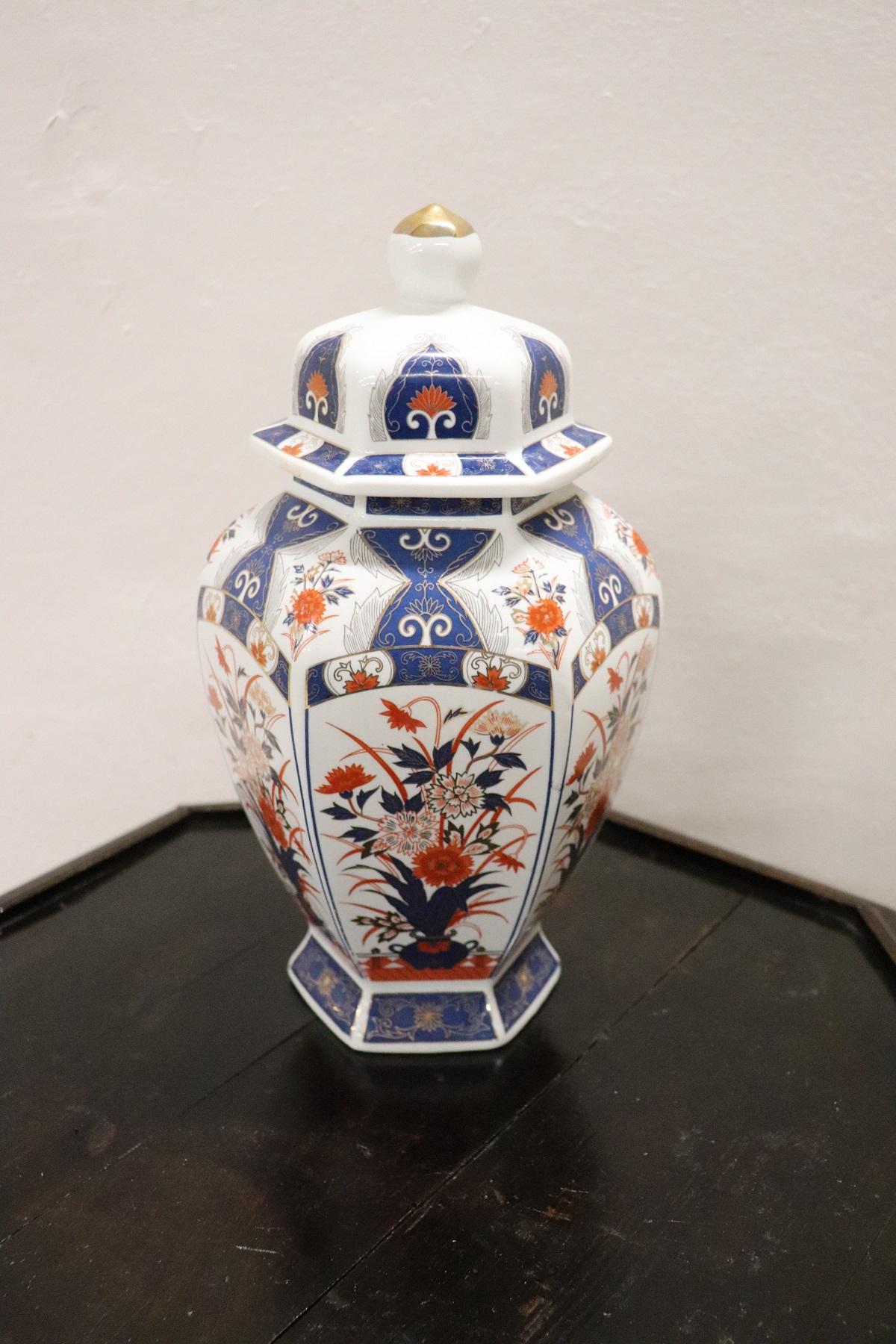 Refined polychrome porcelain vase, Japanese, 1980s. Beautiful hand painted decoration. Ideal for decorating an Asian style home. Brand at the base I.C.W royal Seoul.