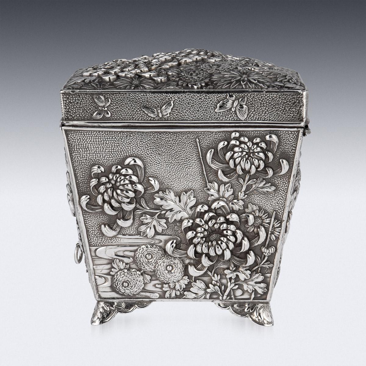 20th Century Japanese silver plated double compartment jewellery chest, of exceptional quality, embossed with with chrysanthemums, butterflies and foliage in high relief on matted ground. Comes with original key and working lock.

Condition
In