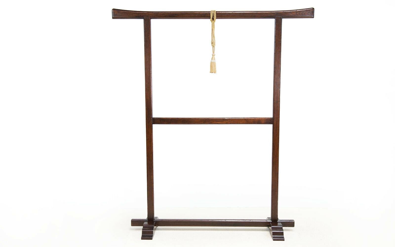 Kimono Display Stands

Offered for sale a pair of decorative 20th century Japanese oriental hardwood kimono display stands. Width 140cm x Height 159cm each feature a gold tassel and sit on support blocks.

The humble beginnings of the kimono,