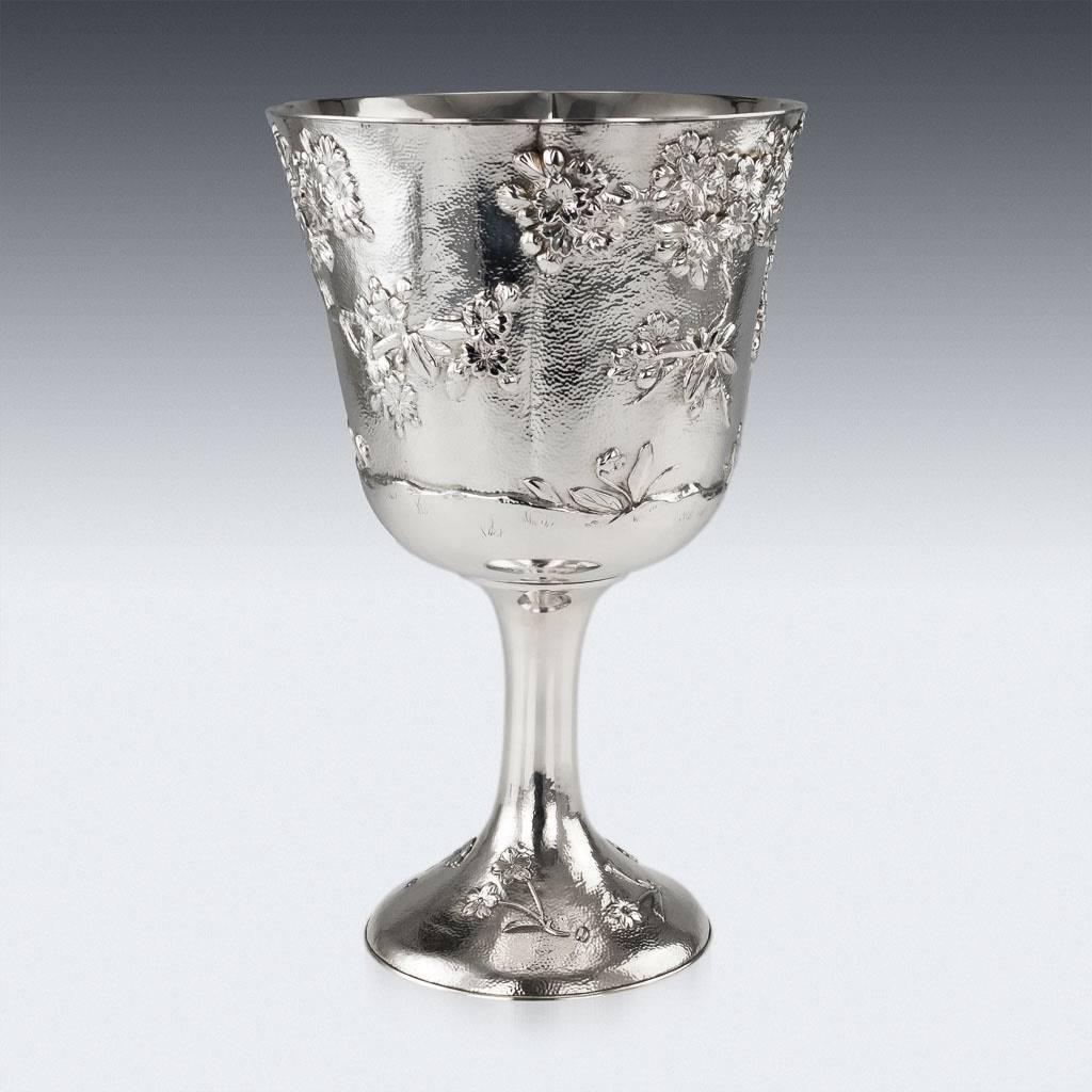 Antique 20th century Japanese solid silver massive goblet, exceptional and magnificent quality, double walled, embossed blooming cherry trees in high relief on hand-hammered matted background. Hallmarked with the Junjin marks (950+ high grade