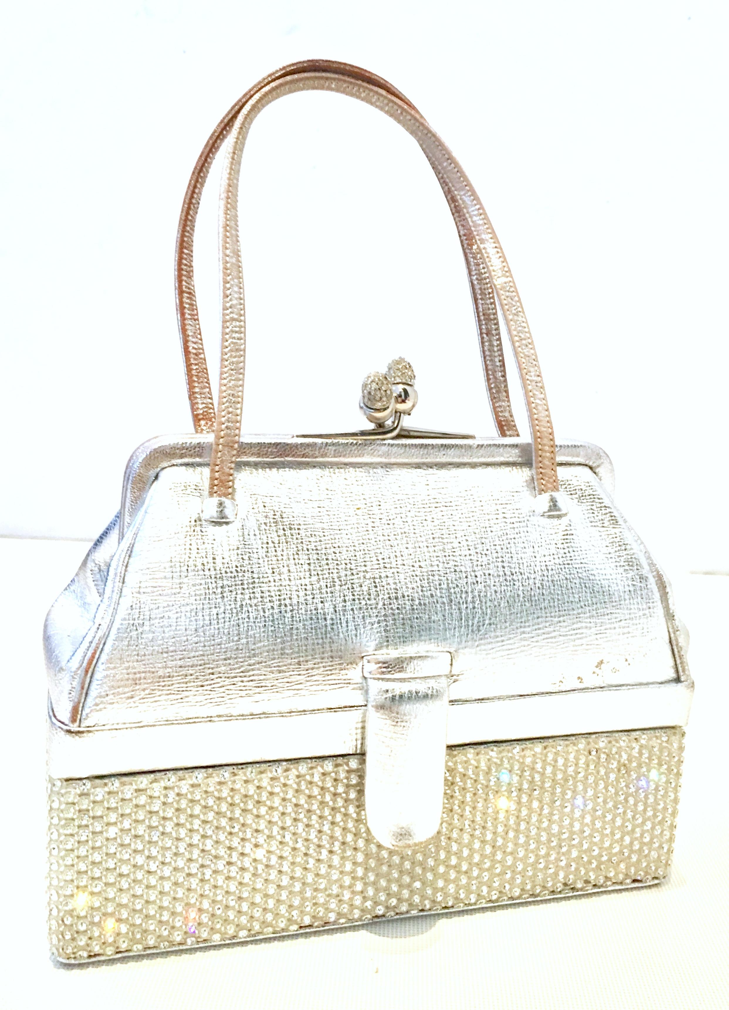 20th Century Judith Leiber Silver Metallic Python & Clear Swarovski Crystal Minaudiere evening bag. Features a Double compartment, two tier 