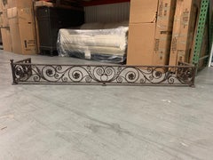20th Century Jumbo Iron Fireplace Fender with Scroll and Floral Detail
