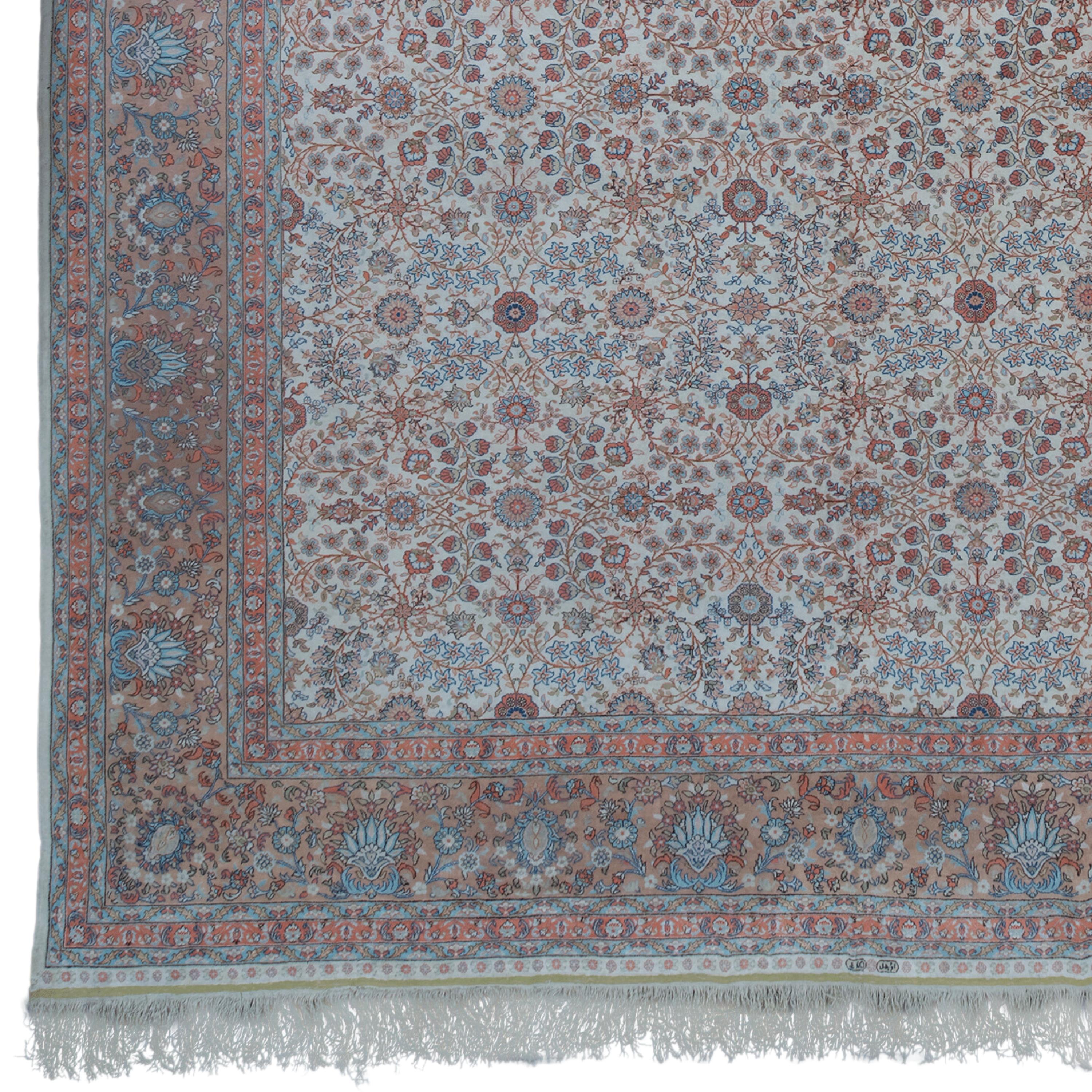 20th Century Kayseri Silk Carpet - Vintage Turkish Silk Carpet

This 20th century antique silk Kayseri rug dazzles with its rich color palette and intricate patterns. This carpet, dominated by shades of blue, red and beige, is full of intense