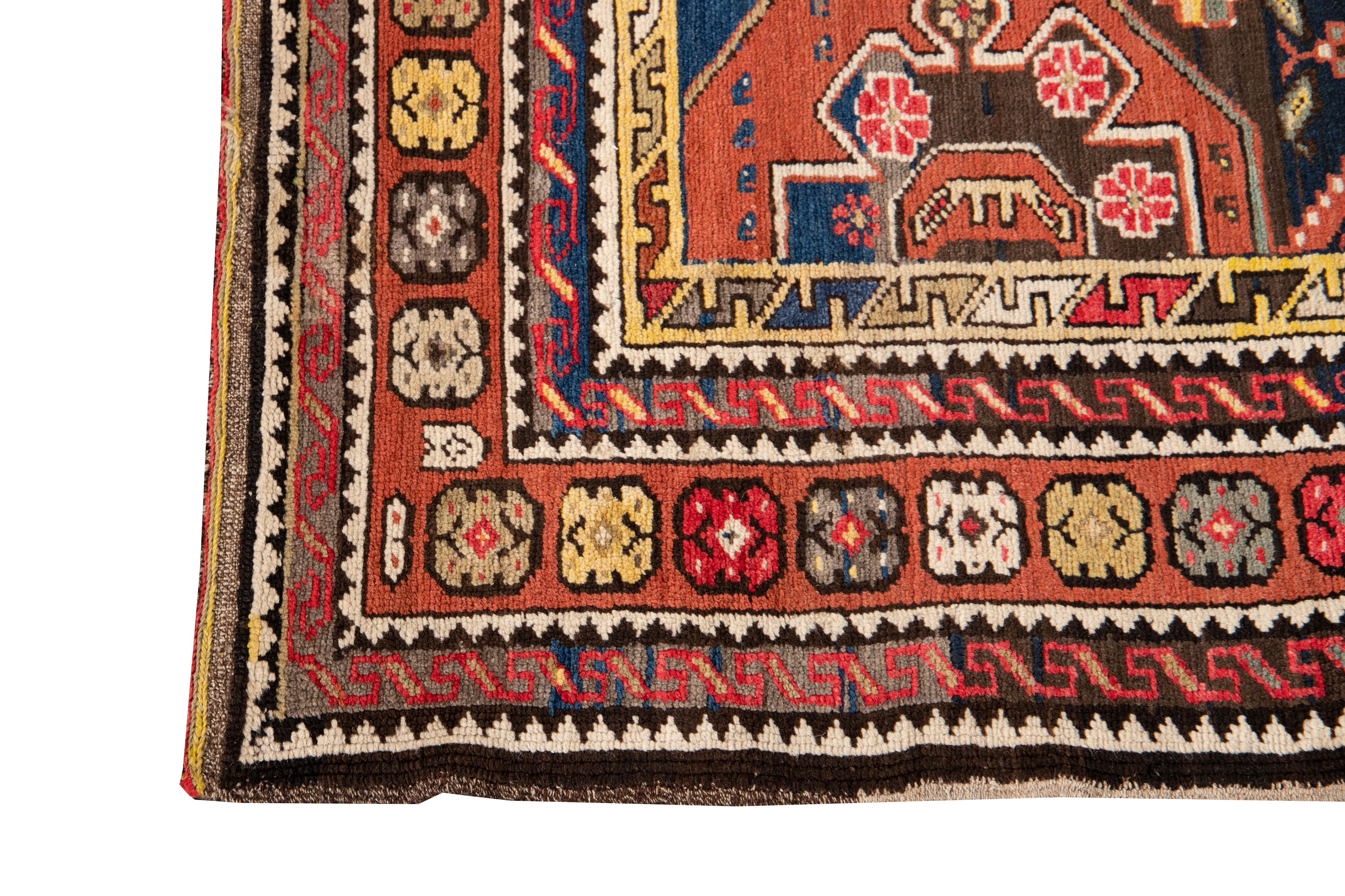 Caucasian 20th Century Kazak Wool Runner with Red Tribal Motif For Sale