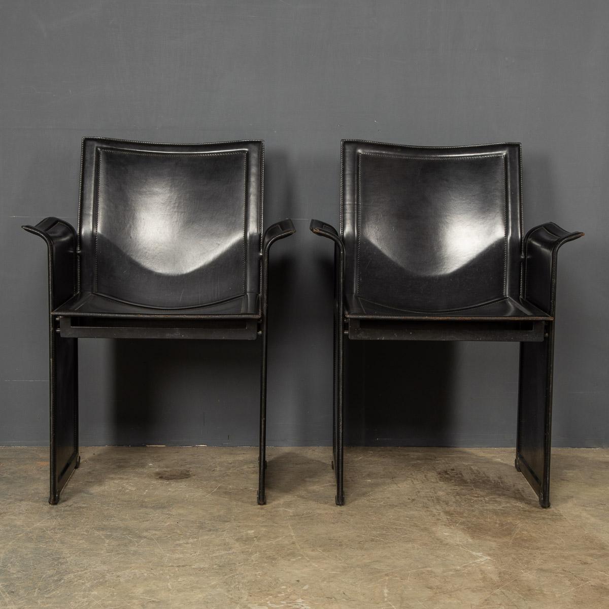 A pair of late 1970's Italian leather chairs. This sleek design is by Tito Agnoli and was manufactured by Matteo Grassi, named the Korium an adaption of the Latin for a skin layer.

Condition
In Good Condition - some wear consistent with normal