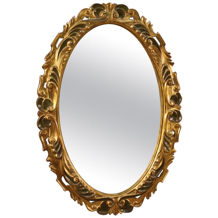 20th Century Lacquered and Giltwood and Plaster Italian Oval Mirror, 1960