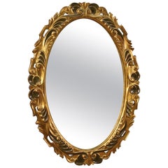 20th Century Lacquered and Giltwood and Plaster Italian Oval Mirror, 1960