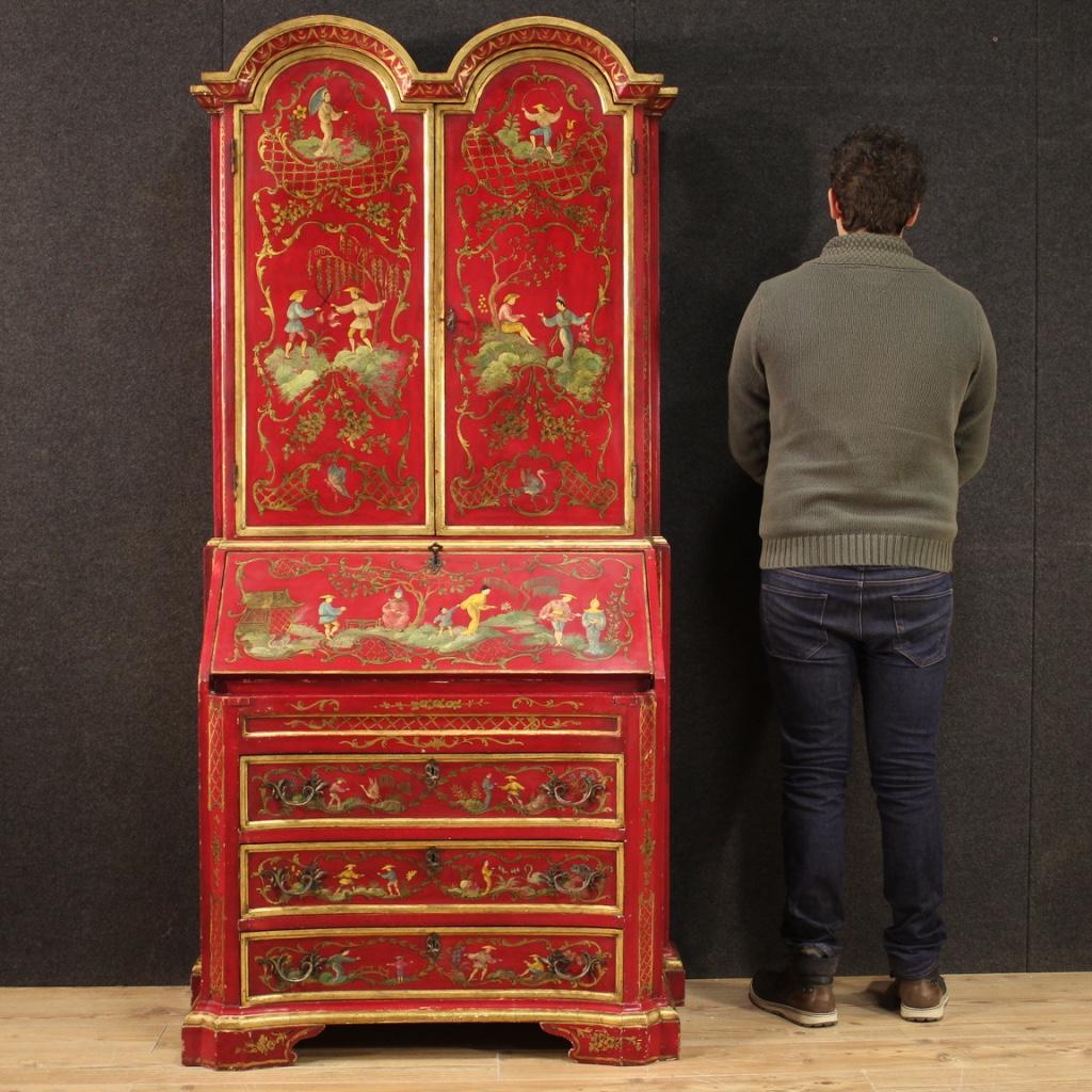 Venetian trumeau from the mid-20th century. Double body cabinet in lacquered, gilded and hand painted wood with very pleasant chinoiserie decorations. Lower body equipped with three external drawers (2nd drawer without lock) of excellent capacity