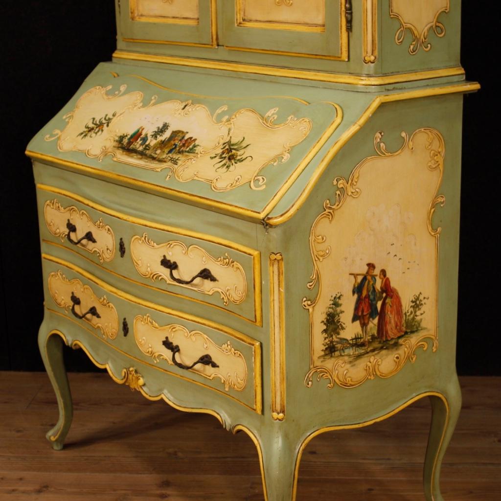 Italian trumeau from 20th century. Beautiful line and pleasant decor furniture in antique-style in carved, lacquered, painted wood and adorned with decoupage with popular characters and scenes. Trumeau double body with high leg equipped with two