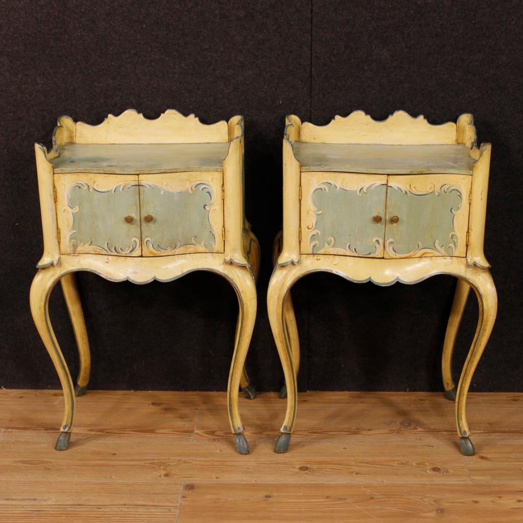 Pair of Venetian bedside tables from the mid-20th century. Furniture of fabulous shape and construction in carved, lacquered and painted wood. Nightstands supported by shapely legs and finished with goat feet. Furniture with two doors of fair