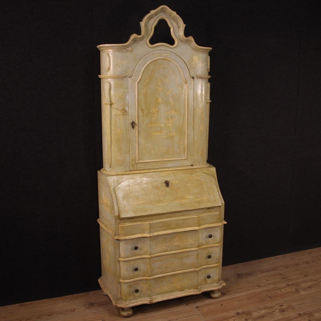 Venetian trumeau from the mid-20th century. Double body cabinet in lacquered and hand painted wood with very pleasant chinoiserie decorations. Trumeau in beautiful patina, finely decorated with oriental views and characters. Furniture equipped with