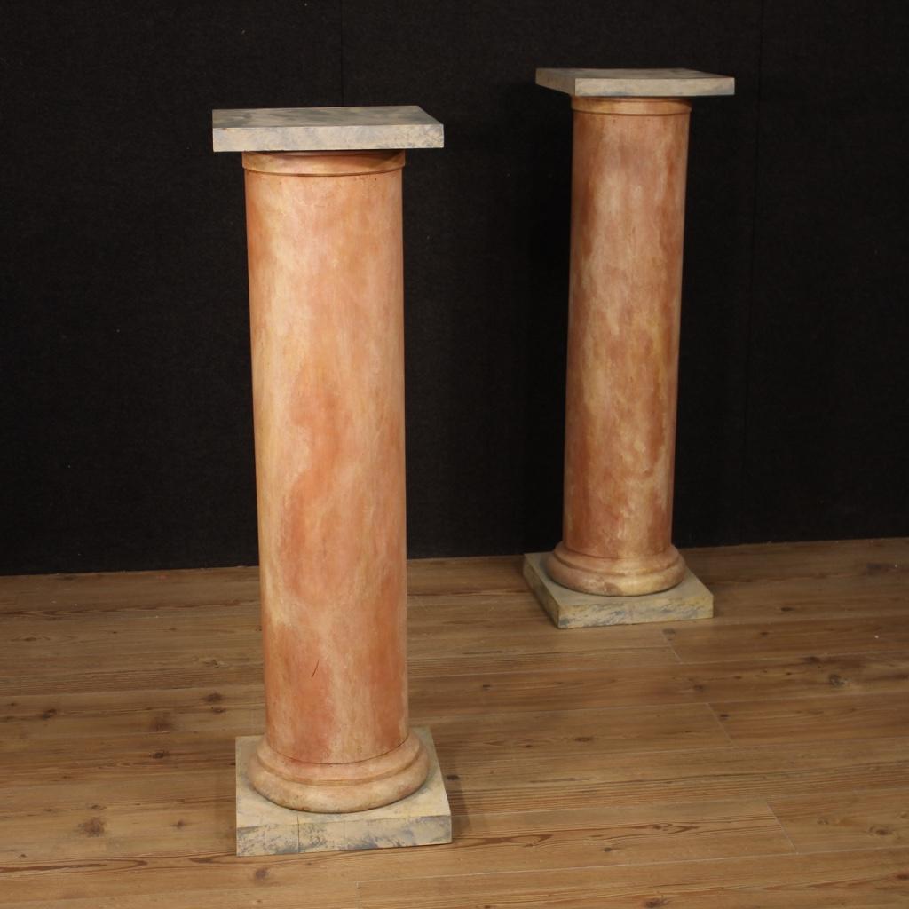 Pair of French columns from the 20th century. Furniture in sculpted and lacquered fake marble wood of great size and pleasant decor. Columns that offer a top of 32 cm per side, of good service. Ideal furniture to exhibit sculptures or vases with