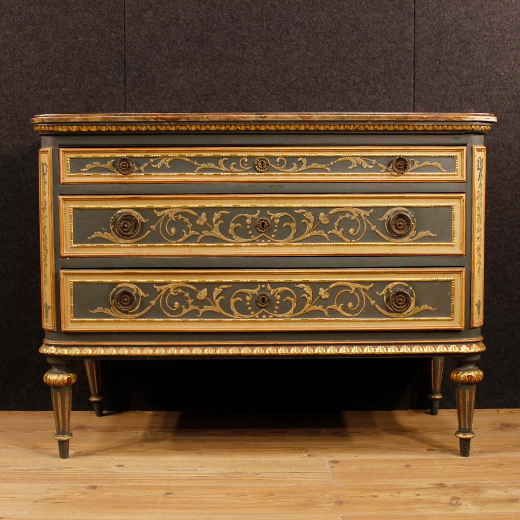 Italian chest of drawers from the mid-20th century. Furniture of great elegance and fabulous decor in Louis XVI style in carved, lacquered, gilded and hand painted wood with floral decorations. Dresser with three drawers of excellent capacity and