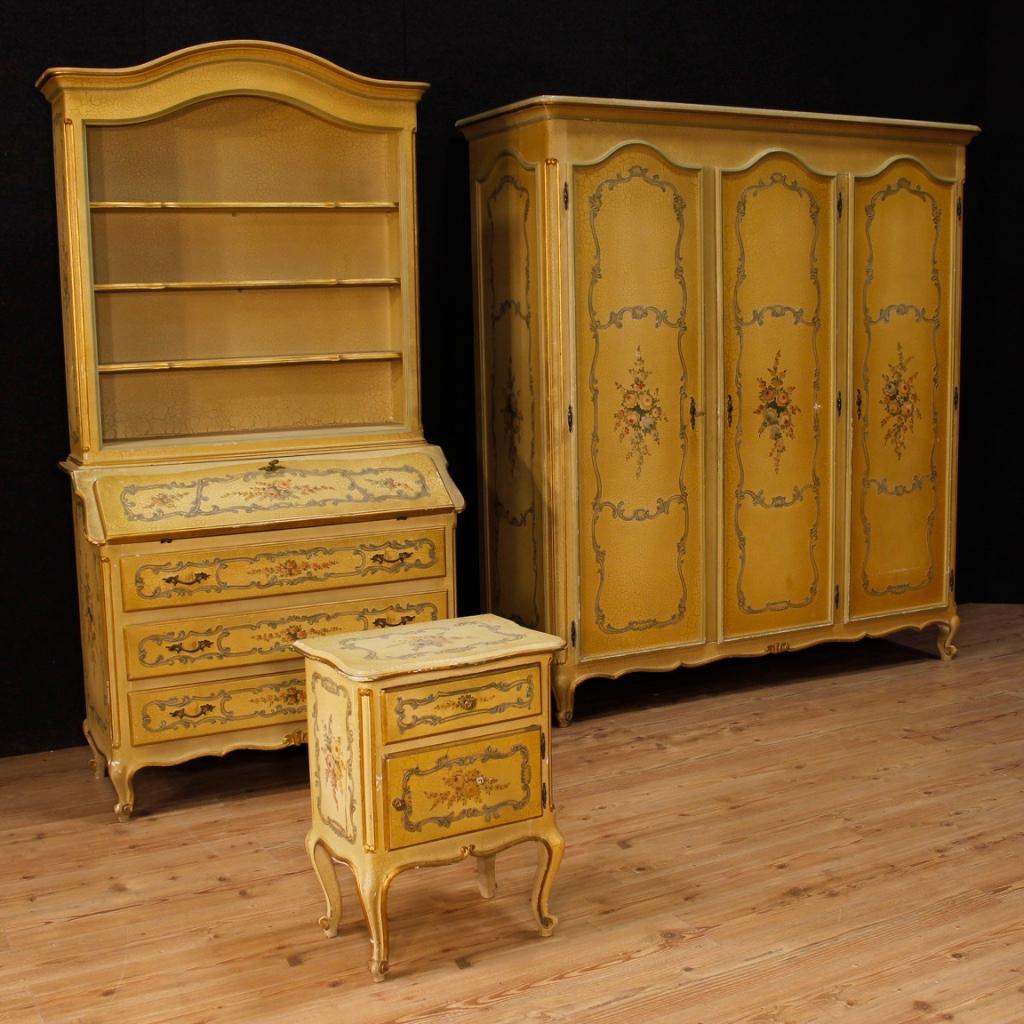 Venetian trumeau from 20th century. Double body cabinet in lacquered, gilded and painted wood with floral decorations of great pleasure. Trumeau for living room with three external drawers of good capacity. Interior of the bureau complete with two