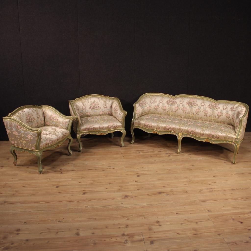 Venetian sofa from the first half of the 20th century. Furniture in wood and plaster finely sculpted, lacquered, gilded and hand painted with very pleasant floral decorations. Sofa finished from the center, elegantly adorned with floral fabric in