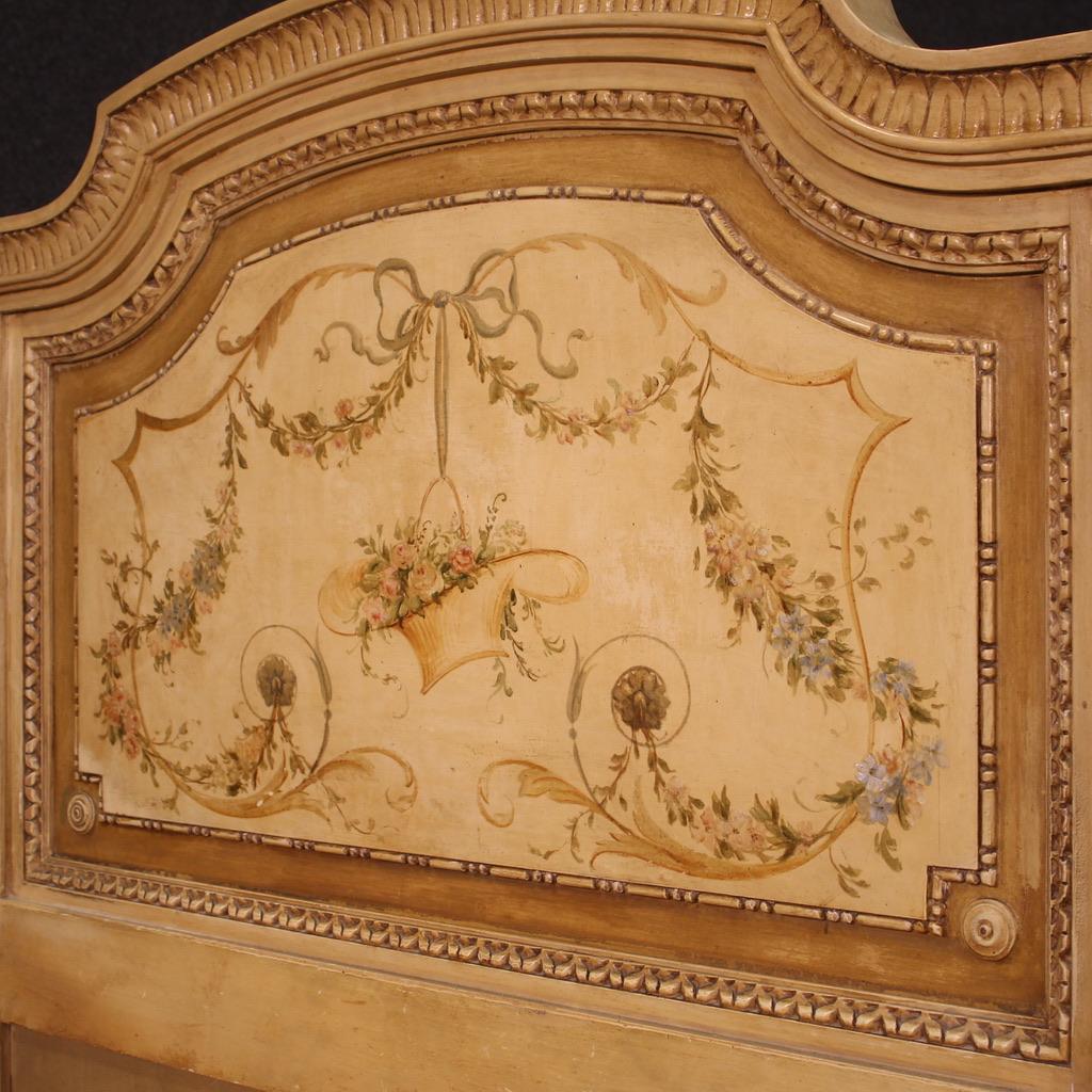 Pair of Italian beds from the mid-20th century. Furniture in carved, lacquered and painted wood in Louis XVI style. Beds made up of 4 wooden elements each, completely removable (headboard, footboard, side rails), structurally sound. Furniture in