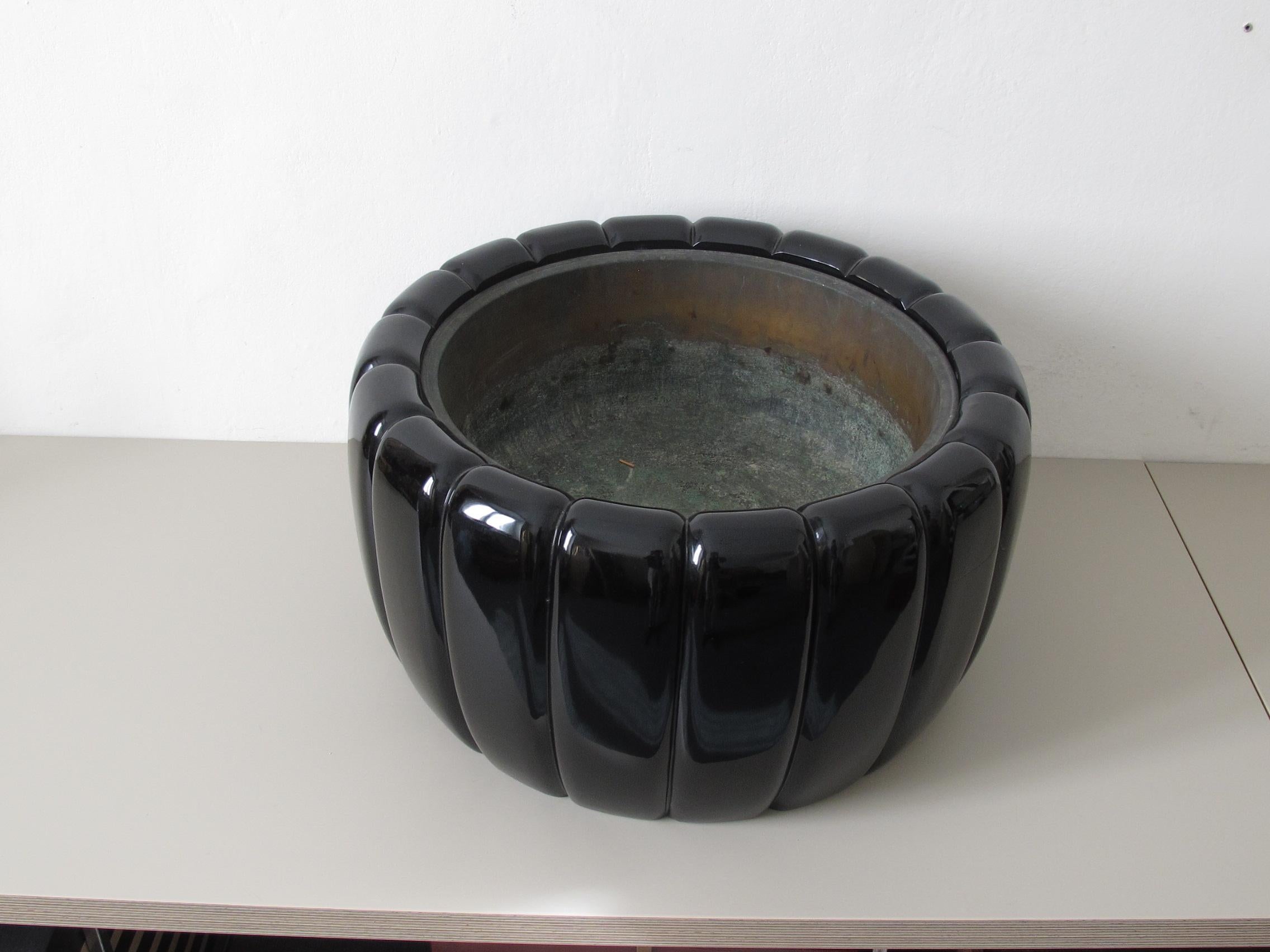 A large black lacquered wood Hibachi (brazier) named Kiku (chrysanthmum) Hibachi.