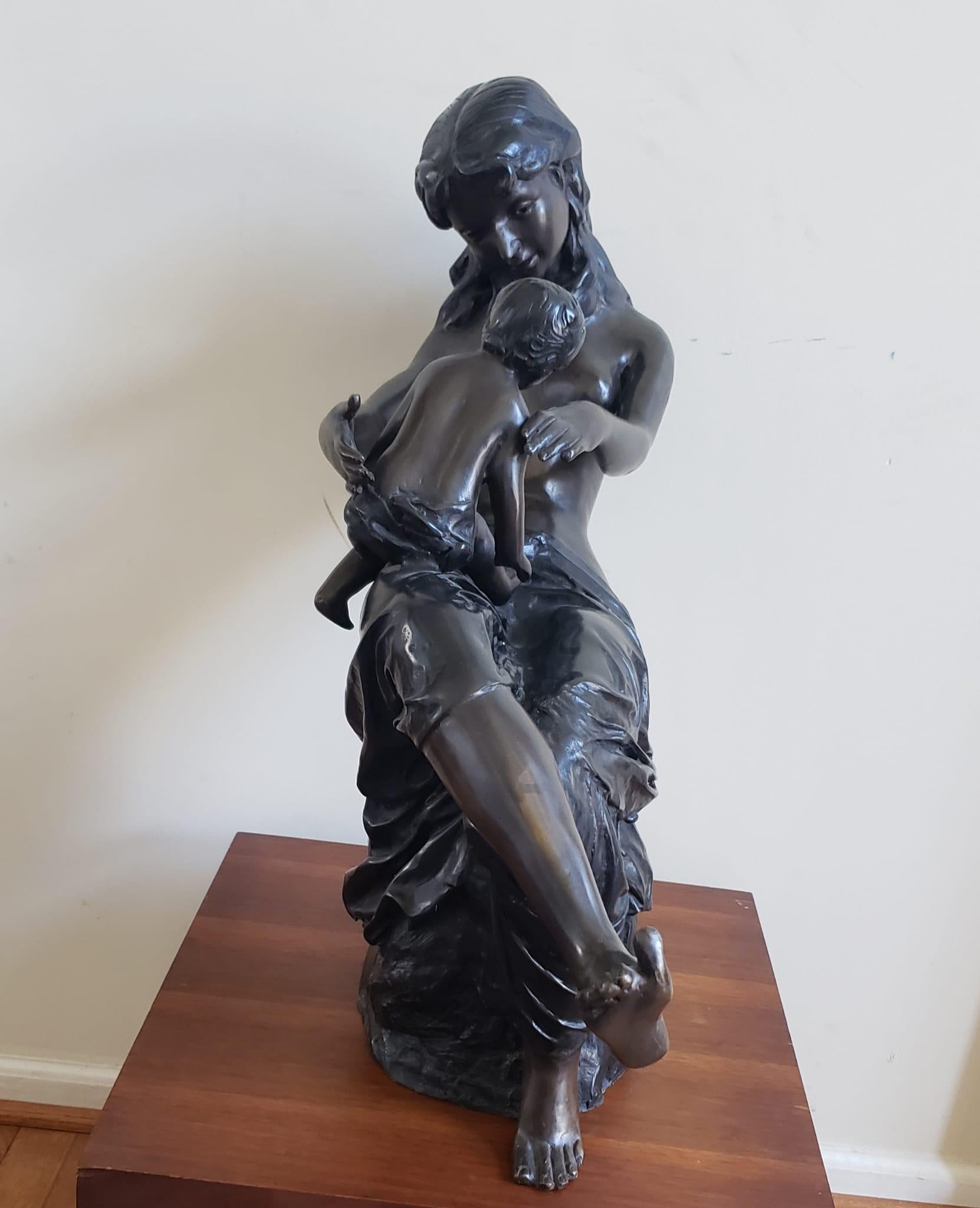 Beaux Arts 20th Century large figurative Bronze Sculpture of a mother and her child. For Sale