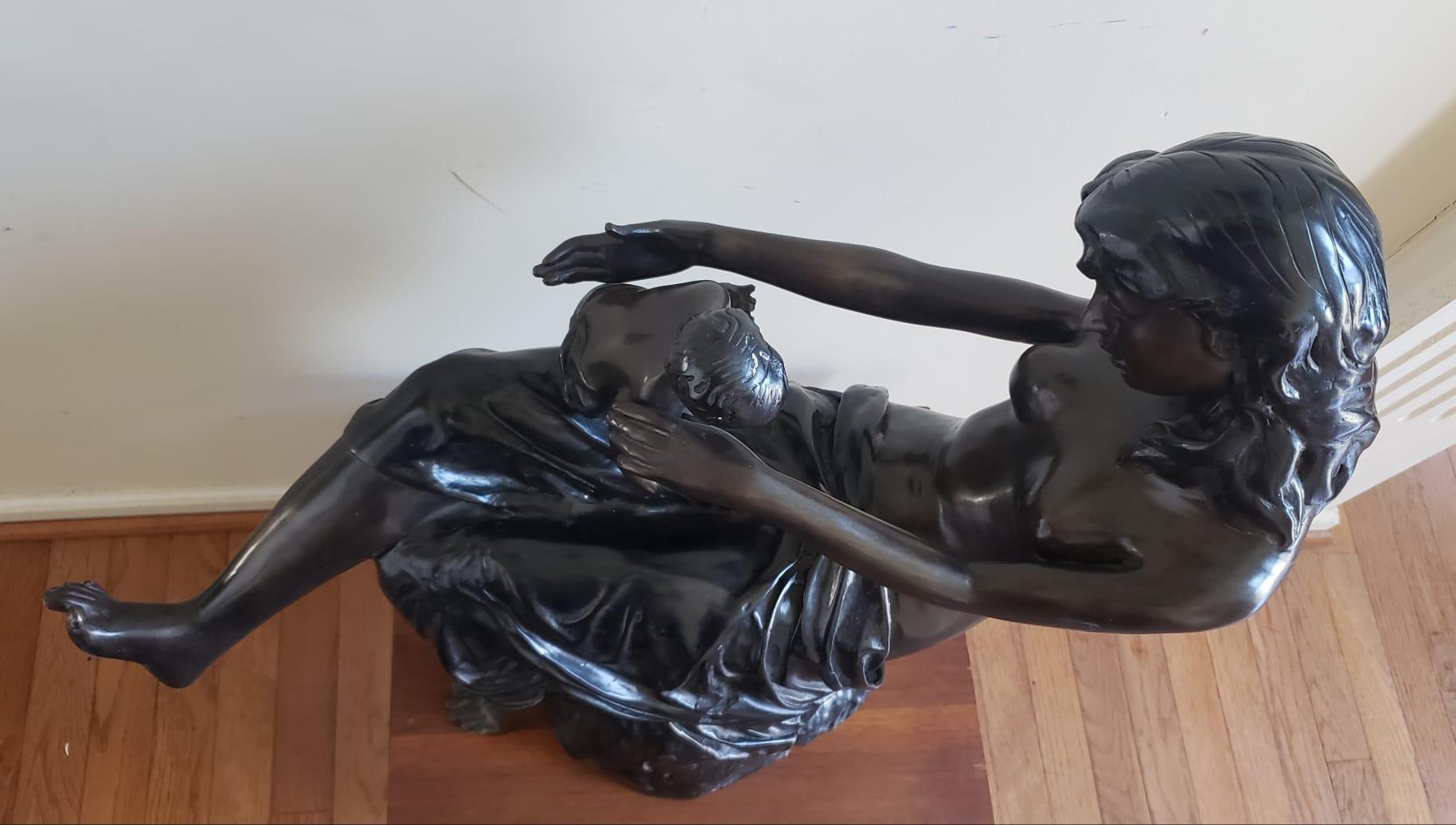 Metalwork 20th Century large figurative Bronze Sculpture of a mother and her child. For Sale