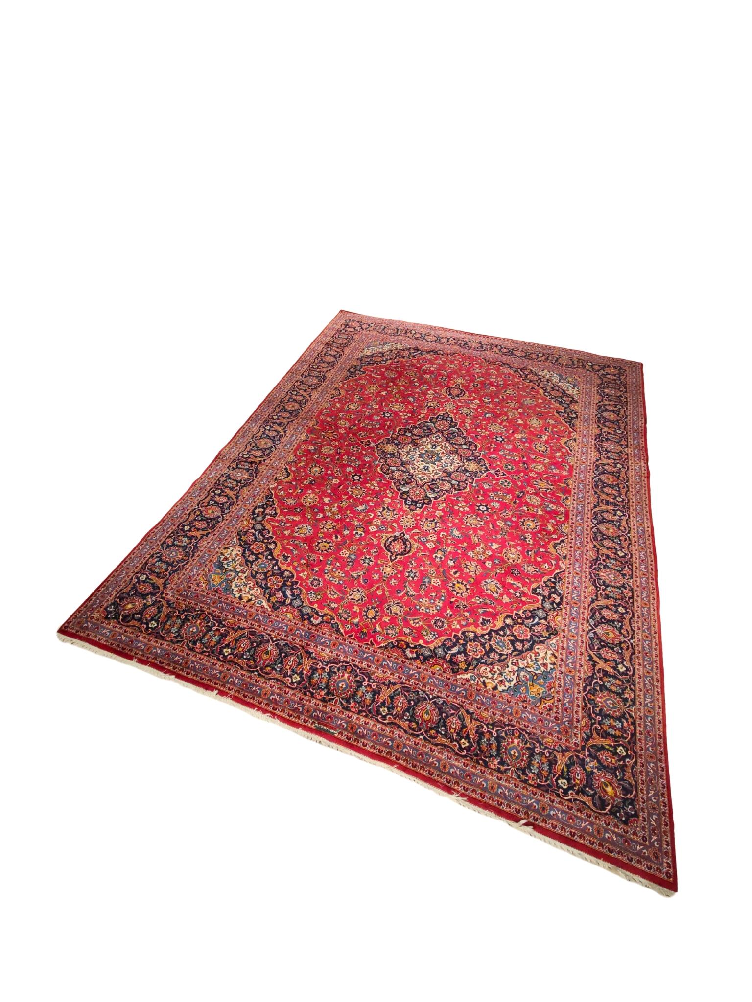 A superb large Persian Kashan carpet, hand-knotted in Iran circa 1960–1980.
The carpet measures 418 × 317 cm (13' 9