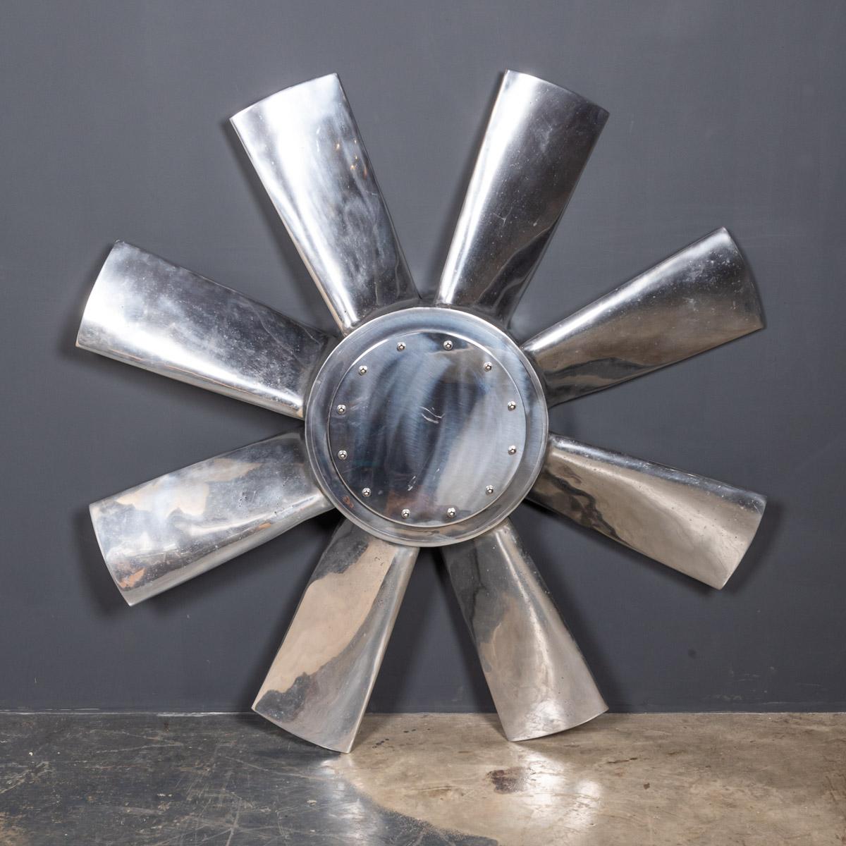 A stunning mid-20th century large aluminium Industrial intake fan blade, polished to an almost mirror finish. This would be an imposing addition to any