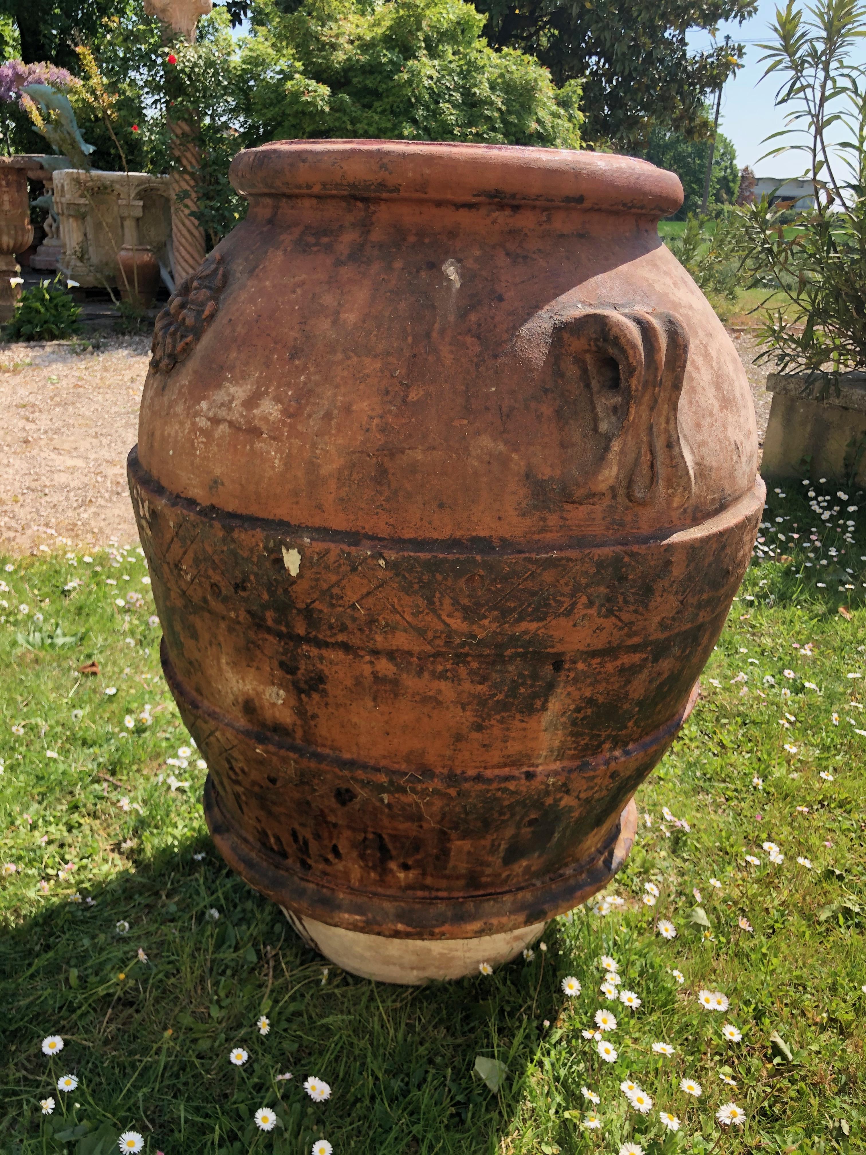 Large 20th italian terrocotta garden  jar / vase by the famous manufacture of Impruneta. It's dated 1900.

Dimensions: Height 105 cm Width 80 cm

In good generale condition.

The most famous kind of Tuscan terracotta is produced in Impruneta,