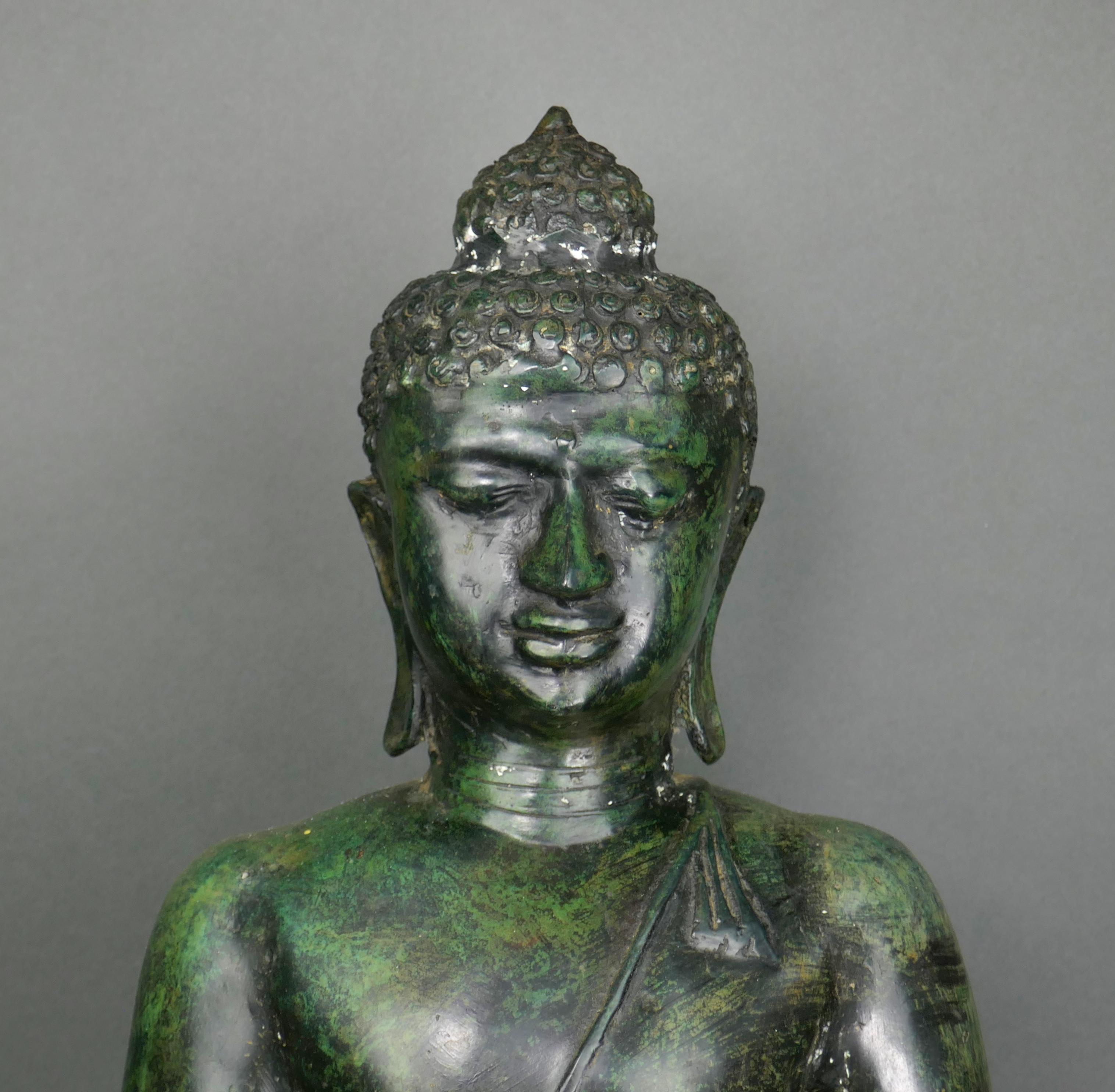 Thinly cast bronze with verdigris finish Buddha from Thailand. This piece was imported to the US in the 1970s and is perfect for the garden or home. Lightweight and easy to manage, weighing just under 15 pounds.