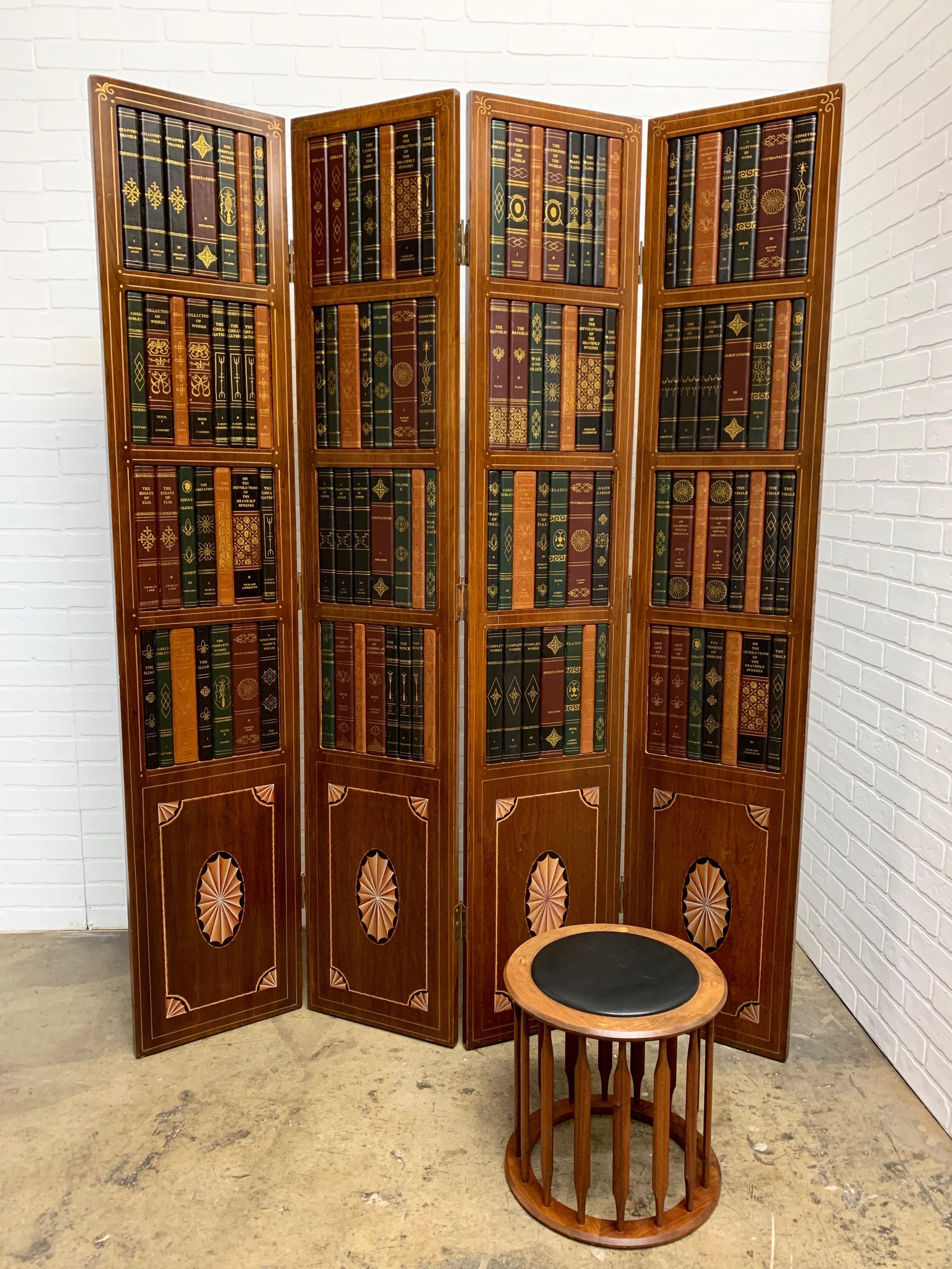 4 panel screen with faux books on the upper panel and inlaid marquetry on the lower panels with some hand painted details.