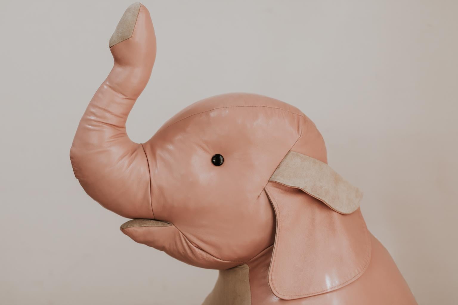 This vintage leather pink elephant brings instant happiness in every interior.
    