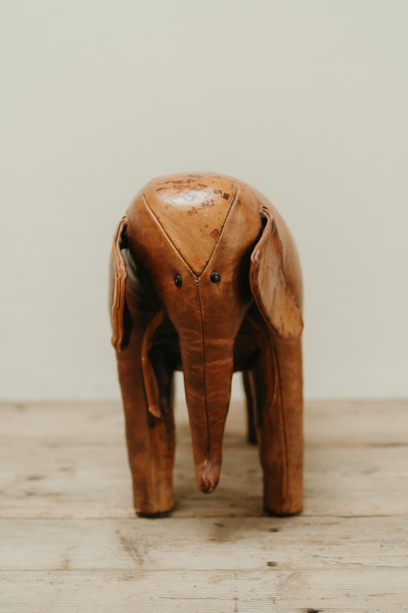 a lovely patinated cognac colored leather elephant by Omersa,
made in the 1960's, used as a pouf ... in very good vintage condition ...